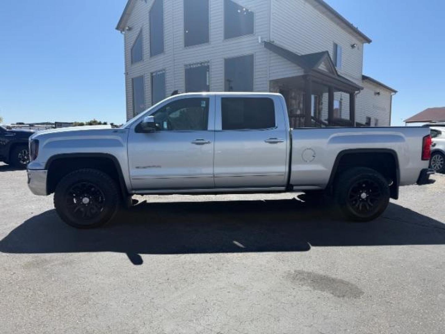 2018 Quicksilver Metallic /Jet Black GMC Sierra 1500 SLE (3GTU2MEC6JG) with an EcoTec3 4.3L V-6 gasoline direct injection engine, AUTOMATIC transmission, located at 1235 N Woodruff Ave., Idaho Falls, 83401, (208) 523-1053, 43.507172, -112.000488 - At Timberline Auto, finding a great deal on your next vehicle is always easy! Our experienced sales staff's goal is to help find you the right vehicle at the right price! Our knowledgeable finance department has options for almost any credit score. We offer extended service contract options to prote - Photo#1