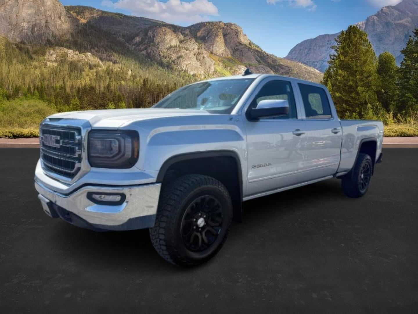 2018 Quicksilver Metallic /Jet Black GMC Sierra 1500 SLE (3GTU2MEC6JG) with an EcoTec3 4.3L V-6 gasoline direct injection engine, AUTOMATIC transmission, located at 1235 N Woodruff Ave., Idaho Falls, 83401, (208) 523-1053, 43.507172, -112.000488 - At Timberline Auto, finding a great deal on your next vehicle is always easy! Our experienced sales staff's goal is to help find you the right vehicle at the right price! Our knowledgeable finance department has options for almost any credit score. We offer extended service contract options to prote - Photo#0