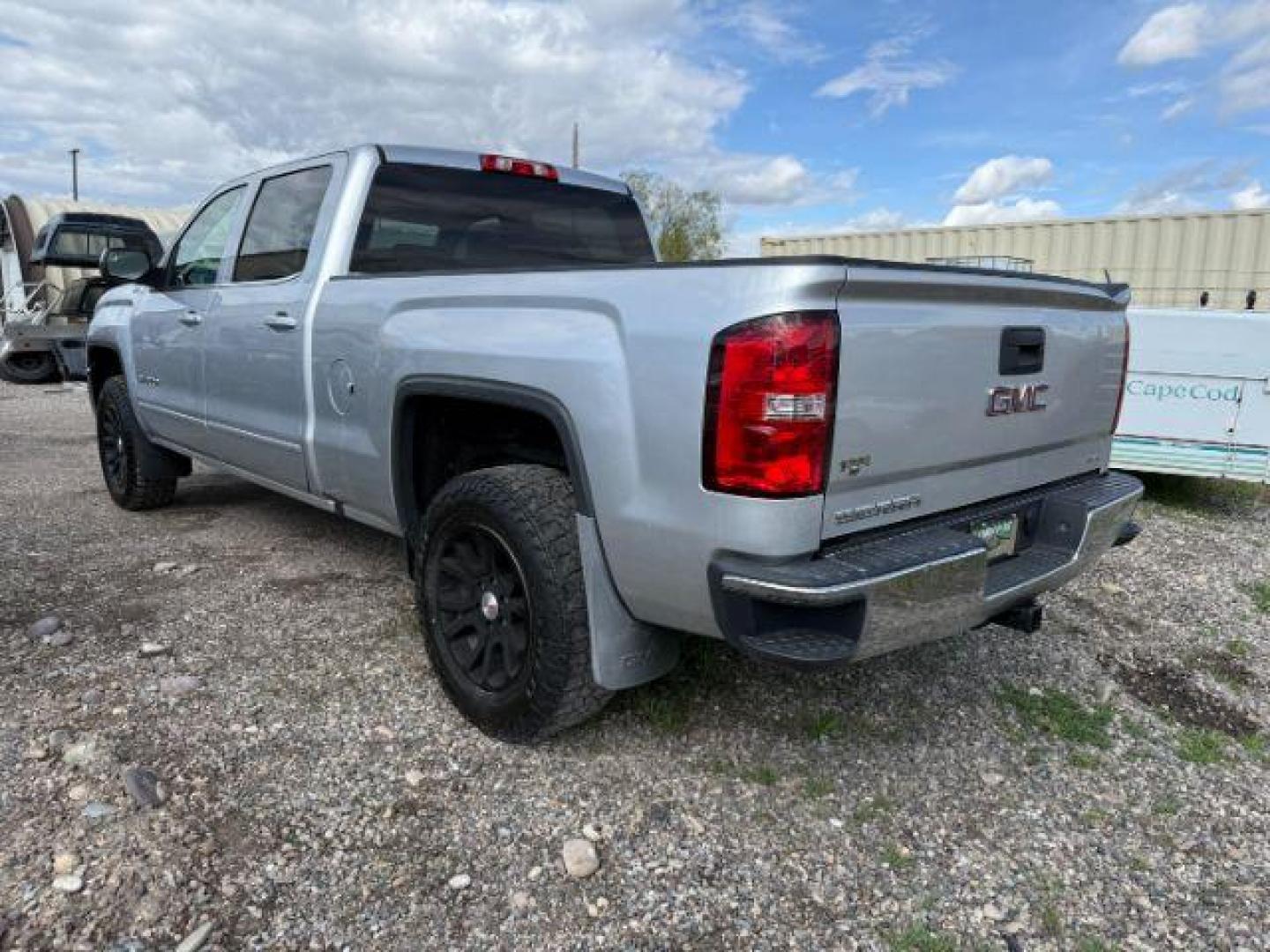 2018 Quicksilver Metallic /Jet Black GMC Sierra 1500 SLE (3GTU2MEC6JG) with an EcoTec3 4.3L V-6 gasoline direct injection engine, AUTOMATIC transmission, located at 1235 N Woodruff Ave., Idaho Falls, 83401, (208) 523-1053, 43.507172, -112.000488 - At Timberline Auto, finding a great deal on your next vehicle is always easy! Our experienced sales staff's goal is to help find you the right vehicle at the right price! Our knowledgeable finance department has options for almost any credit score. We offer extended service contract options to prote - Photo#1