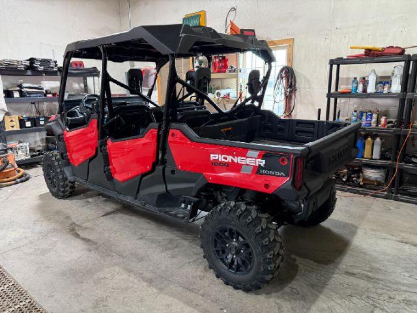 2023 RED /BASE HONDA PIONEER 1000 (1HFVE0848P4) with an 1000CC engine, AUTO transmission, located at 1235 N Woodruff Ave., Idaho Falls, 83401, (208) 523-1053, 43.507172, -112.000488 - At Timberline Auto, finding a great deal on your next vehicle is always easy! Our experienced sales staff's goal is to help find you the right vehicle at the right price! Our knowledgeable finance department has options for almost any credit score. We offer extended service contract options to prote - Photo#2