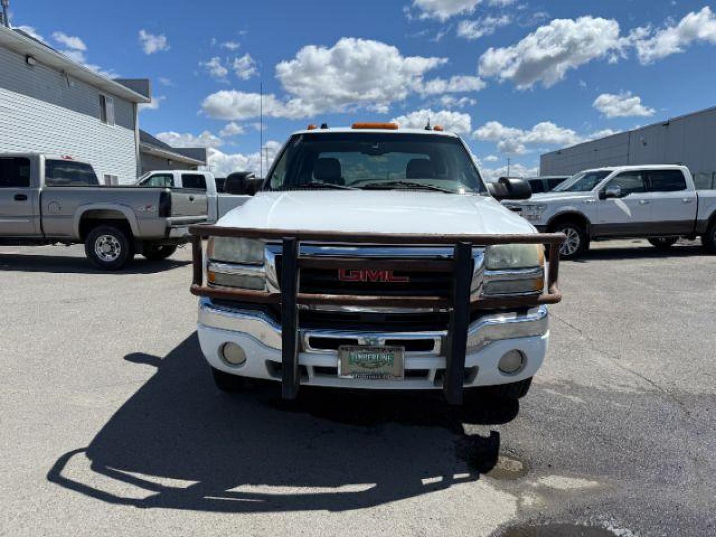2004 Summit White /Dark Pewter GMC Sierra 3500 SLT (1GTJK33G24F) with an 8.1 engine, AUTOMATIC transmission, located at 1235 N Woodruff Ave., Idaho Falls, 83401, (208) 523-1053, 43.507172, -112.000488 - At Timberline Auto, finding a great deal on your next vehicle is always easy! Our experienced sales staff's goal is to help find you the right vehicle at the right price! Our knowledgeable finance department has options for almost any credit score. We offer extended service contract options to prote - Photo#6