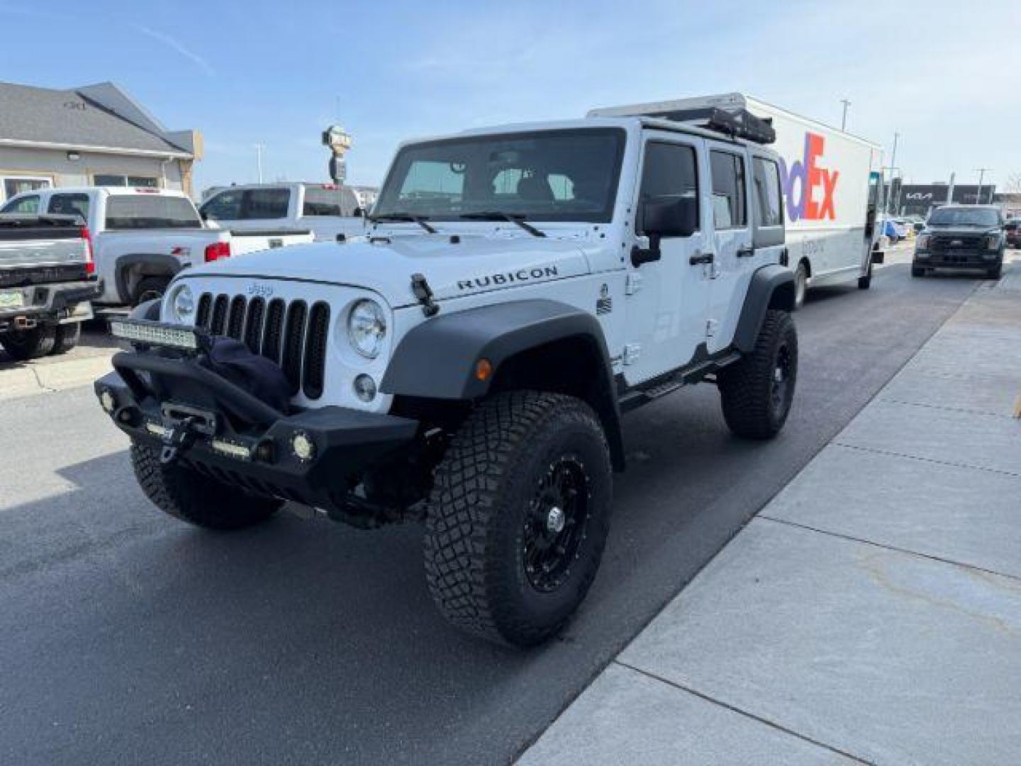 2016 Bright White Clearcoat /Black Jeep Wrangler Unlimited Rubicon (1C4BJWFG1GL) with an Pentastar 3.6L V-6 DOHC engine, AUTOMATIC transmission, located at 1235 N Woodruff Ave., Idaho Falls, 83401, (208) 523-1053, 43.507172, -112.000488 - Photo#0