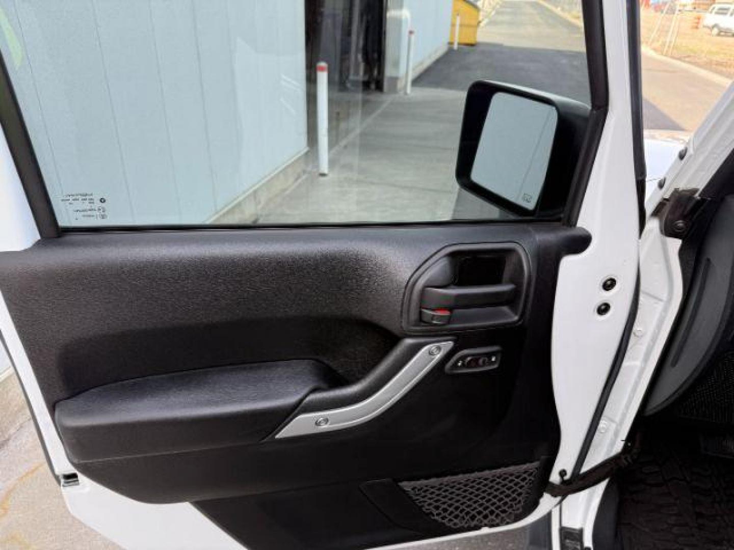 2016 Bright White Clearcoat /Black Jeep Wrangler Unlimited Rubicon (1C4BJWFG1GL) with an Pentastar 3.6L V-6 DOHC engine, AUTOMATIC transmission, located at 1235 N Woodruff Ave., Idaho Falls, 83401, (208) 523-1053, 43.507172, -112.000488 - Photo#9