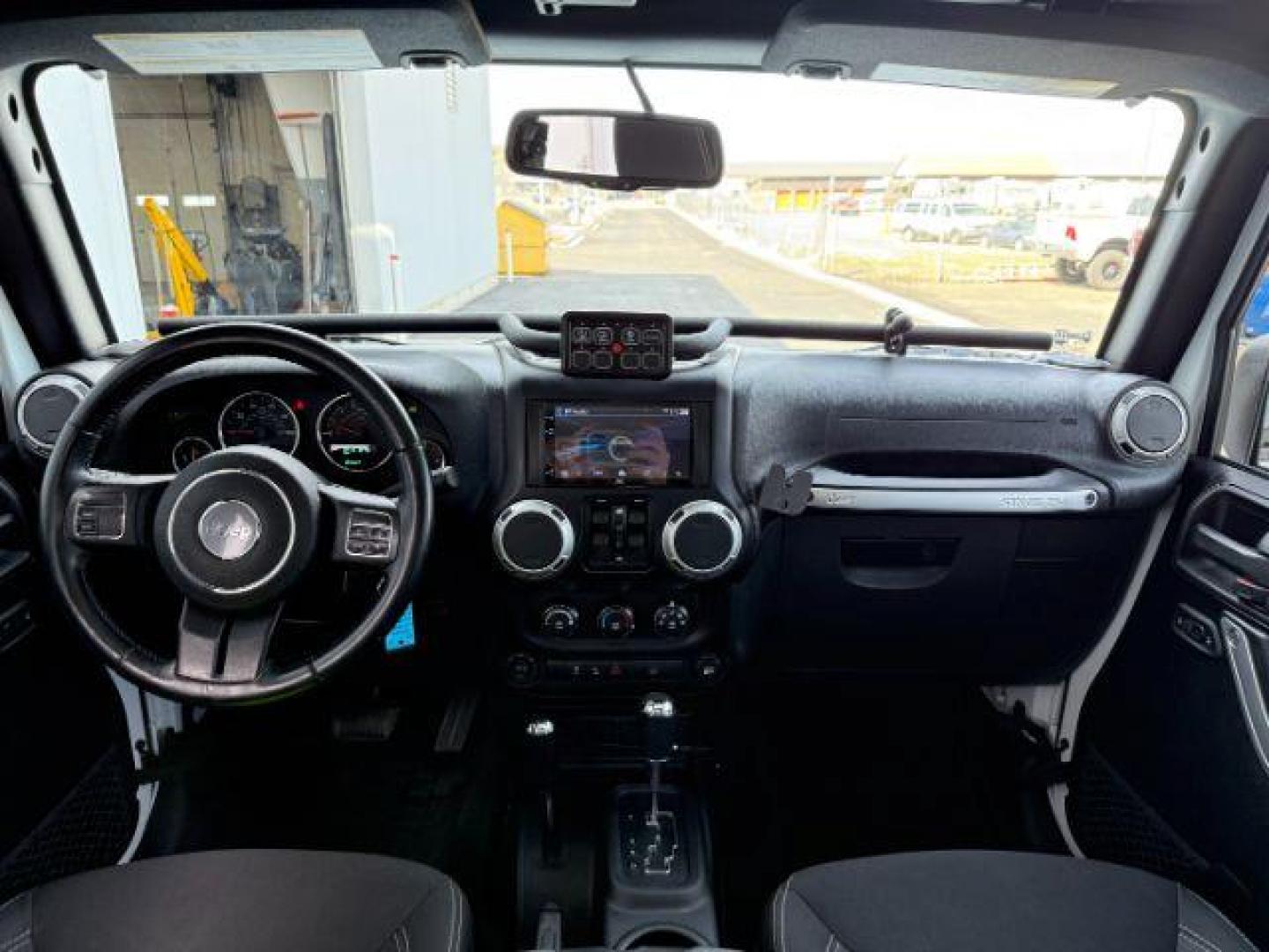 2016 Bright White Clearcoat /Black Jeep Wrangler Unlimited Rubicon (1C4BJWFG1GL) with an Pentastar 3.6L V-6 DOHC engine, AUTOMATIC transmission, located at 1235 N Woodruff Ave., Idaho Falls, 83401, (208) 523-1053, 43.507172, -112.000488 - Photo#11