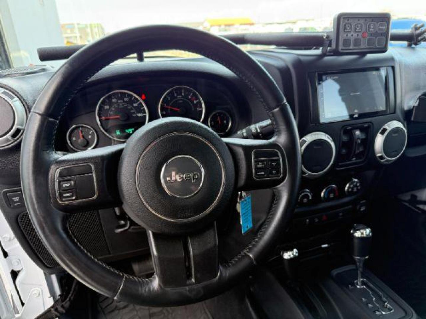 2016 Bright White Clearcoat /Black Jeep Wrangler Unlimited Rubicon (1C4BJWFG1GL) with an Pentastar 3.6L V-6 DOHC engine, AUTOMATIC transmission, located at 1235 N Woodruff Ave., Idaho Falls, 83401, (208) 523-1053, 43.507172, -112.000488 - Photo#12