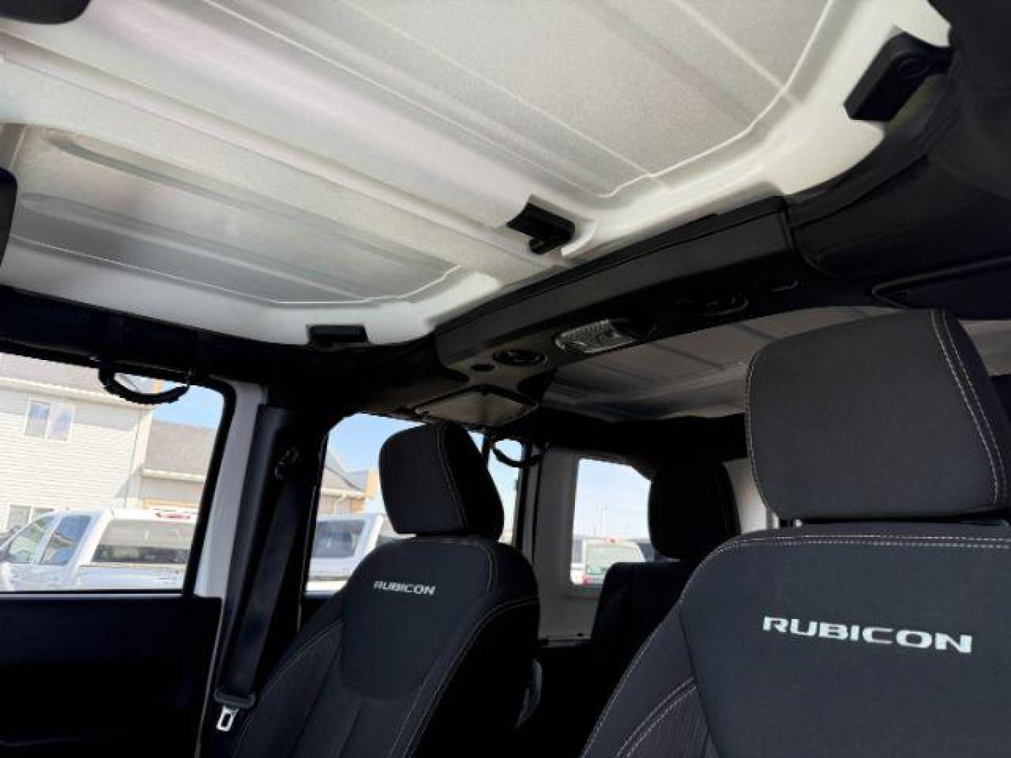 2016 Bright White Clearcoat /Black Jeep Wrangler Unlimited Rubicon (1C4BJWFG1GL) with an Pentastar 3.6L V-6 DOHC engine, AUTOMATIC transmission, located at 1235 N Woodruff Ave., Idaho Falls, 83401, (208) 523-1053, 43.507172, -112.000488 - Photo#16