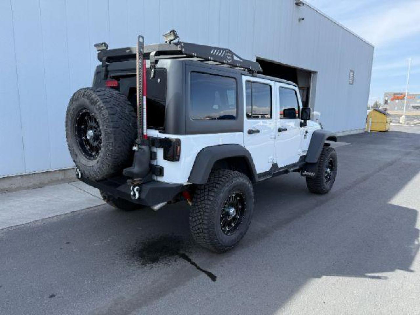 2016 Bright White Clearcoat /Black Jeep Wrangler Unlimited Rubicon (1C4BJWFG1GL) with an Pentastar 3.6L V-6 DOHC engine, AUTOMATIC transmission, located at 1235 N Woodruff Ave., Idaho Falls, 83401, (208) 523-1053, 43.507172, -112.000488 - Photo#3
