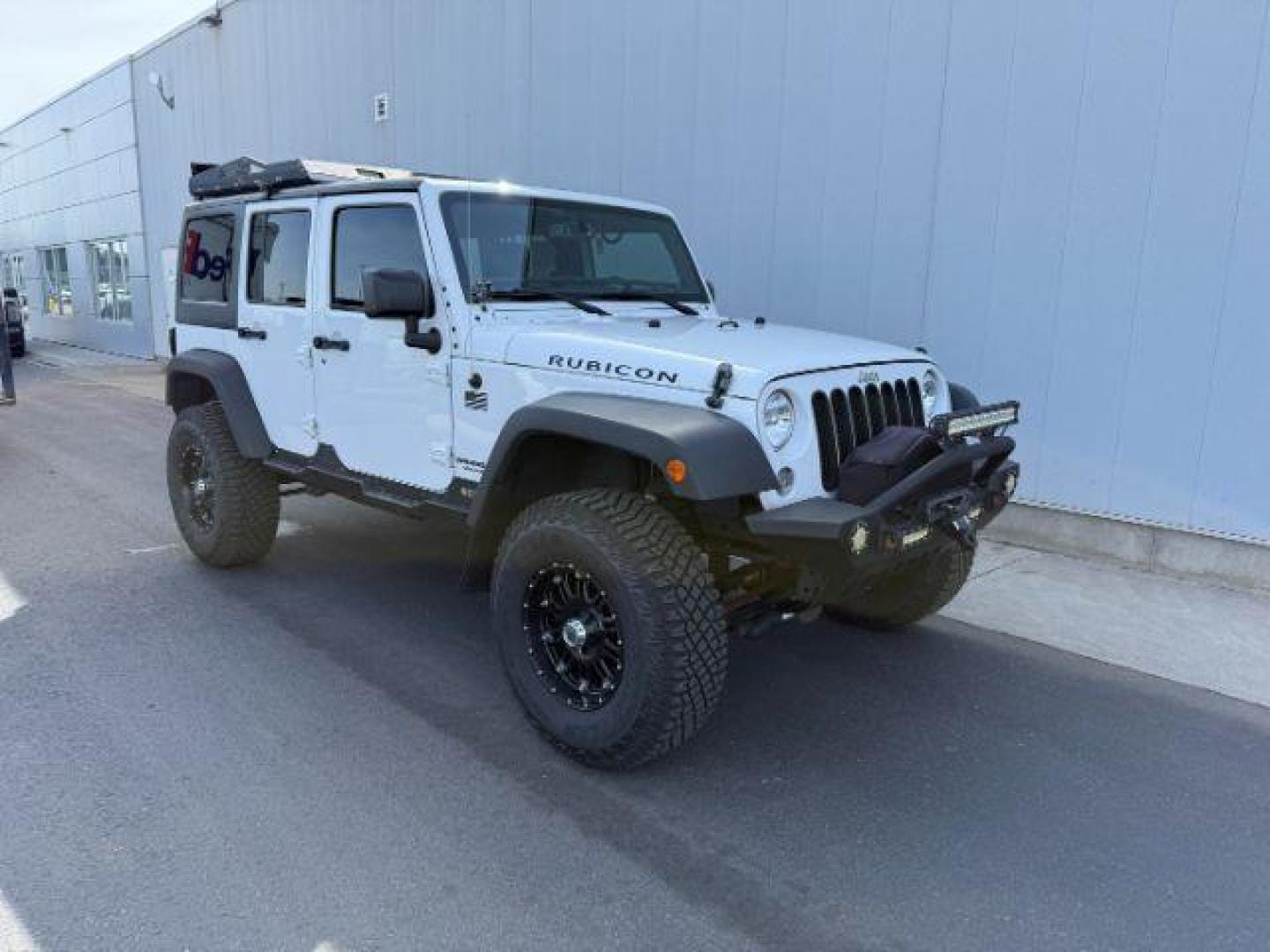 2016 Bright White Clearcoat /Black Jeep Wrangler Unlimited Rubicon (1C4BJWFG1GL) with an Pentastar 3.6L V-6 DOHC engine, AUTOMATIC transmission, located at 1235 N Woodruff Ave., Idaho Falls, 83401, (208) 523-1053, 43.507172, -112.000488 - Photo#5