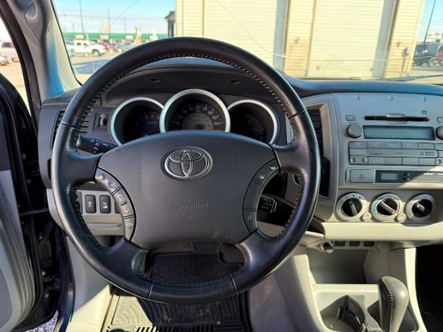 2009 BLACK /Graphite Toyota Tacoma Base V6 (3TMLU42N69M) with an 4L V-6 DOHC engine, AUTOMATIC transmission, located at 1235 N Woodruff Ave., Idaho Falls, 83401, (208) 523-1053, 43.507172, -112.000488 - At Timberline Auto, finding a great deal on your next vehicle is always easy! Our experienced sales staff's goal is to help find you the right vehicle at the right price! Our knowledgeable finance department has options for almost any credit score. We offer extended service contract options to prote - Photo#7