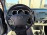 2009 BLACK /Graphite Toyota Tacoma Base V6 (3TMLU42N69M) with an 4L V-6 DOHC engine, AUTOMATIC transmission, located at 1235 N Woodruff Ave., Idaho Falls, 83401, (208) 523-1053, 43.507172, -112.000488 - At Timberline Auto, finding a great deal on your next vehicle is always easy! Our experienced sales staff's goal is to help find you the right vehicle at the right price! Our knowledgeable finance department has options for almost any credit score. We offer extended service contract options to prote - Photo#7