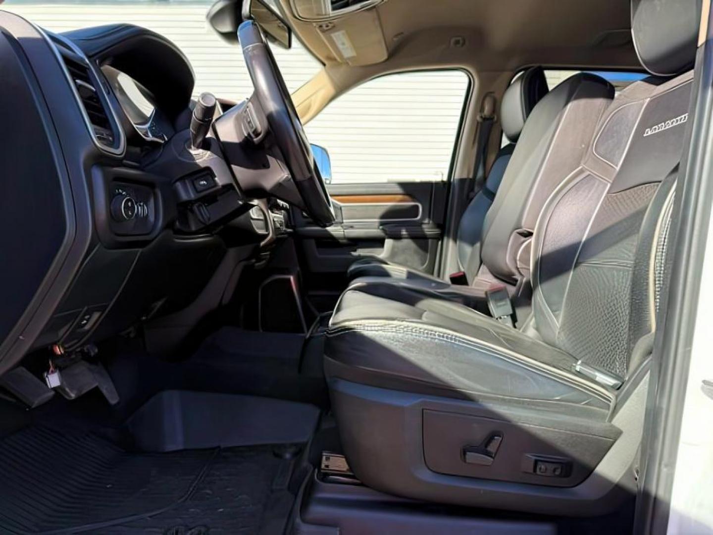 2022 Bright White Clearcoat /Black Ram 2500 (3C6UR5NL6NG) with an 67 engine, Automatic transmission, located at 1175 N Woodruff Ave, Idaho Falls, ID, 83401, 43.506901, -111.999657 - At Timberline Auto, finding a great deal on your next vehicle is always easy! Our experienced sales staff's goal is to help find you the right vehicle at the right price! Our knowledgeable finance department has options for almost any credit score. We offer extended service contract options to prote - Photo#11