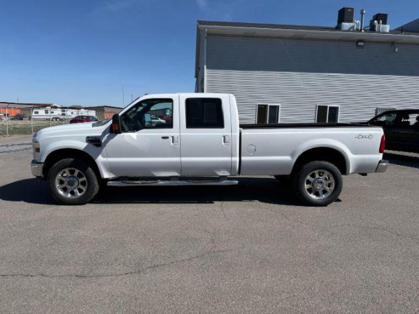 2010 Oxford White /Ebony Ford F-350 LARIAT (1FTWW3BR8AE) with an Powerstroke 6.4L V-8 diesel direct injection engine, AUTOMATIC transmission, located at 1235 N Woodruff Ave., Idaho Falls, 83401, (208) 523-1053, 43.507172, -112.000488 - At Timberline Auto, finding a great deal on your next vehicle is always easy! Our experienced sales staff's goal is to help find you the right vehicle at the right price! Our knowledgeable finance department has options for almost any credit score. We offer extended service contract options to prote - Photo#1