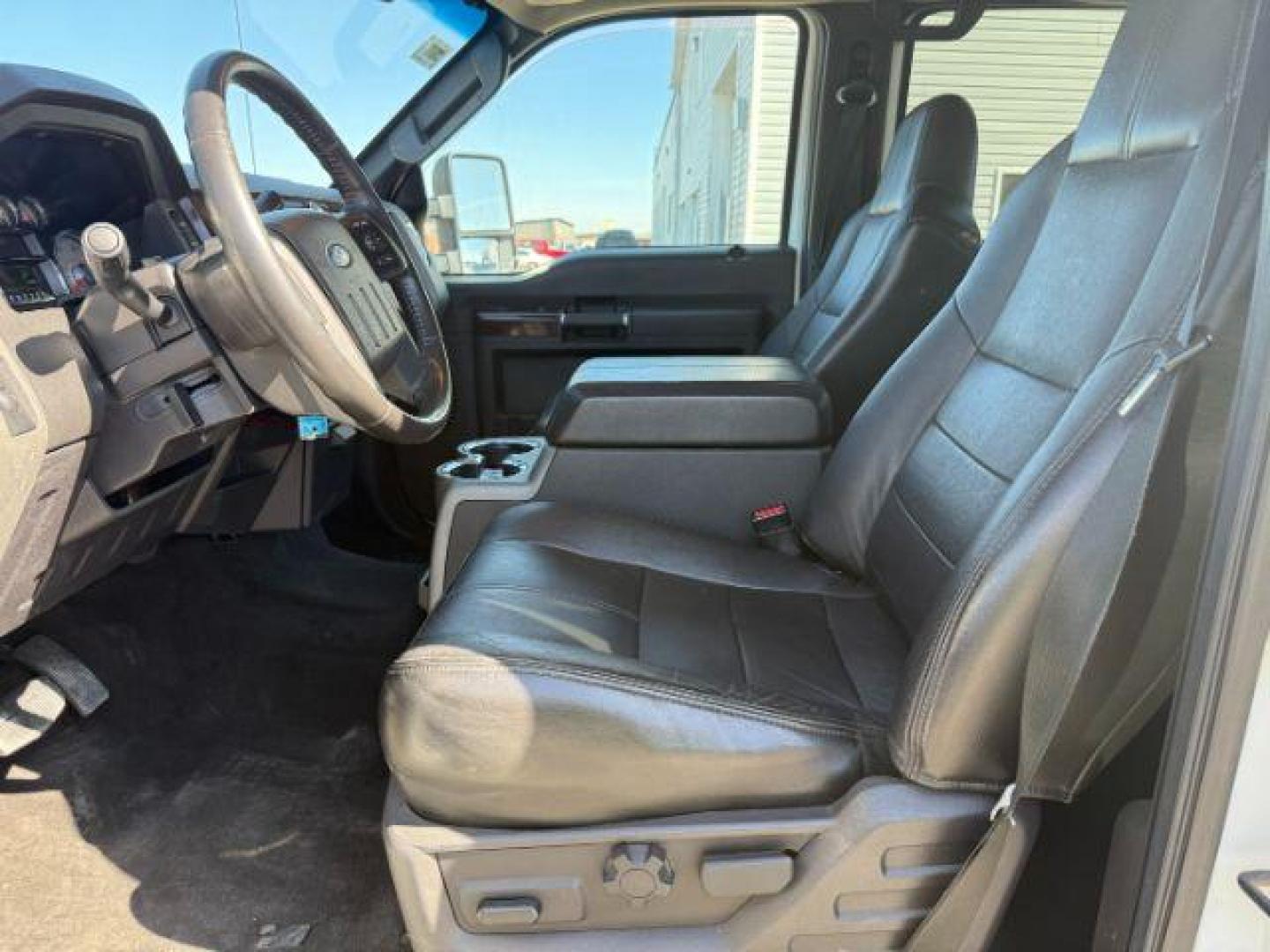 2010 Oxford White /Ebony Ford F-350 LARIAT (1FTWW3BR8AE) with an Powerstroke 6.4L V-8 diesel direct injection engine, AUTOMATIC transmission, located at 1235 N Woodruff Ave., Idaho Falls, 83401, (208) 523-1053, 43.507172, -112.000488 - At Timberline Auto, finding a great deal on your next vehicle is always easy! Our experienced sales staff's goal is to help find you the right vehicle at the right price! Our knowledgeable finance department has options for almost any credit score. We offer extended service contract options to prote - Photo#9