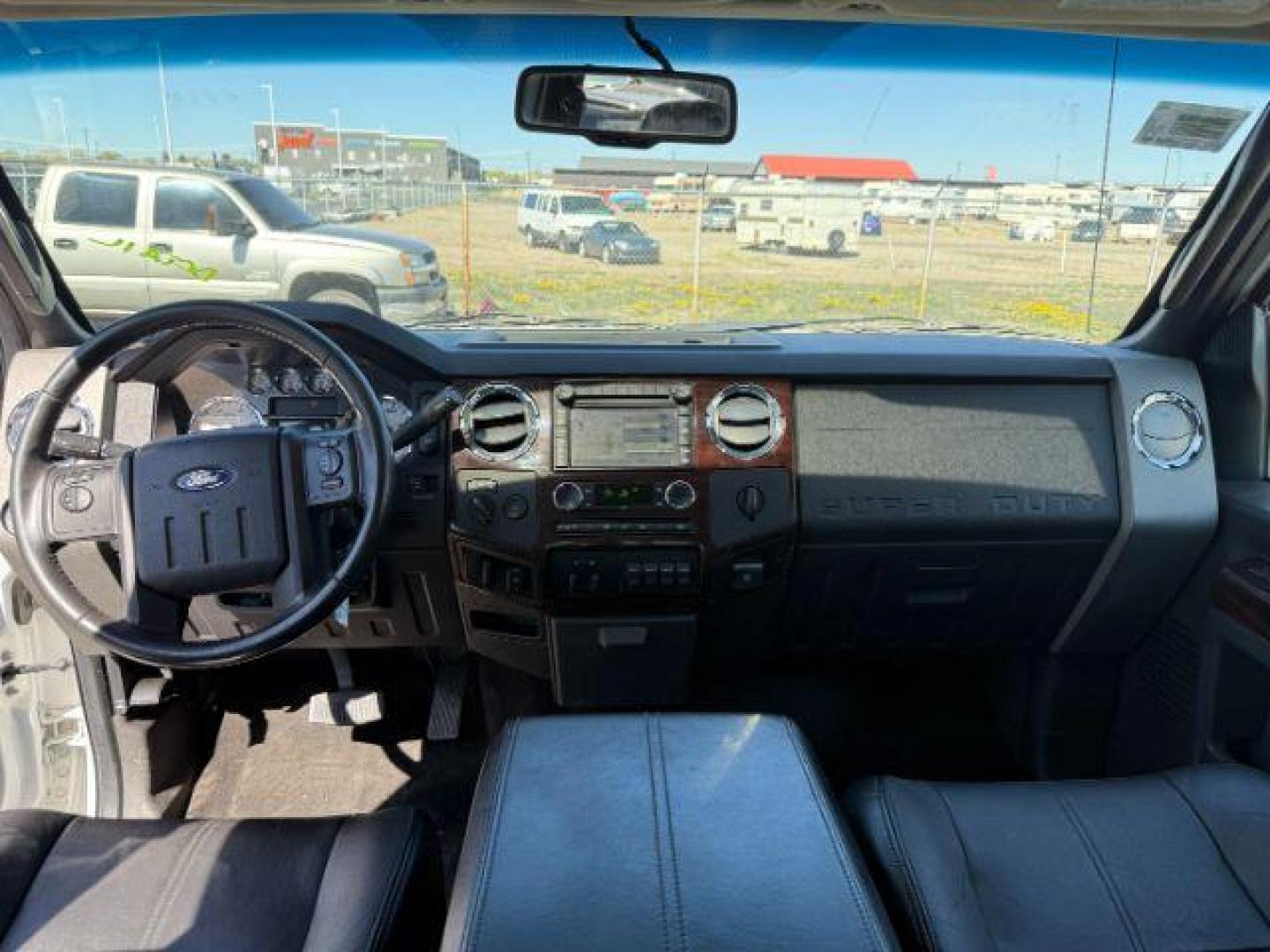 2010 Oxford White /Ebony Ford F-350 LARIAT (1FTWW3BR8AE) with an Powerstroke 6.4L V-8 diesel direct injection engine, AUTOMATIC transmission, located at 1235 N Woodruff Ave., Idaho Falls, 83401, (208) 523-1053, 43.507172, -112.000488 - At Timberline Auto, finding a great deal on your next vehicle is always easy! Our experienced sales staff's goal is to help find you the right vehicle at the right price! Our knowledgeable finance department has options for almost any credit score. We offer extended service contract options to prote - Photo#18