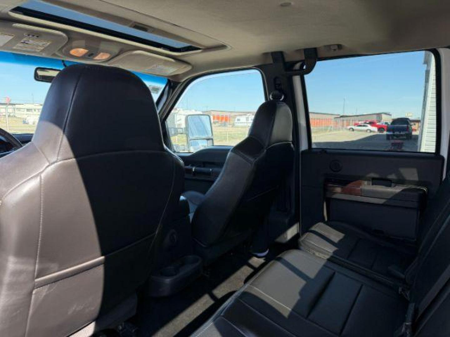 2010 Oxford White /Ebony Ford F-350 LARIAT (1FTWW3BR8AE) with an Powerstroke 6.4L V-8 diesel direct injection engine, AUTOMATIC transmission, located at 1235 N Woodruff Ave., Idaho Falls, 83401, (208) 523-1053, 43.507172, -112.000488 - At Timberline Auto, finding a great deal on your next vehicle is always easy! Our experienced sales staff's goal is to help find you the right vehicle at the right price! Our knowledgeable finance department has options for almost any credit score. We offer extended service contract options to prote - Photo#19