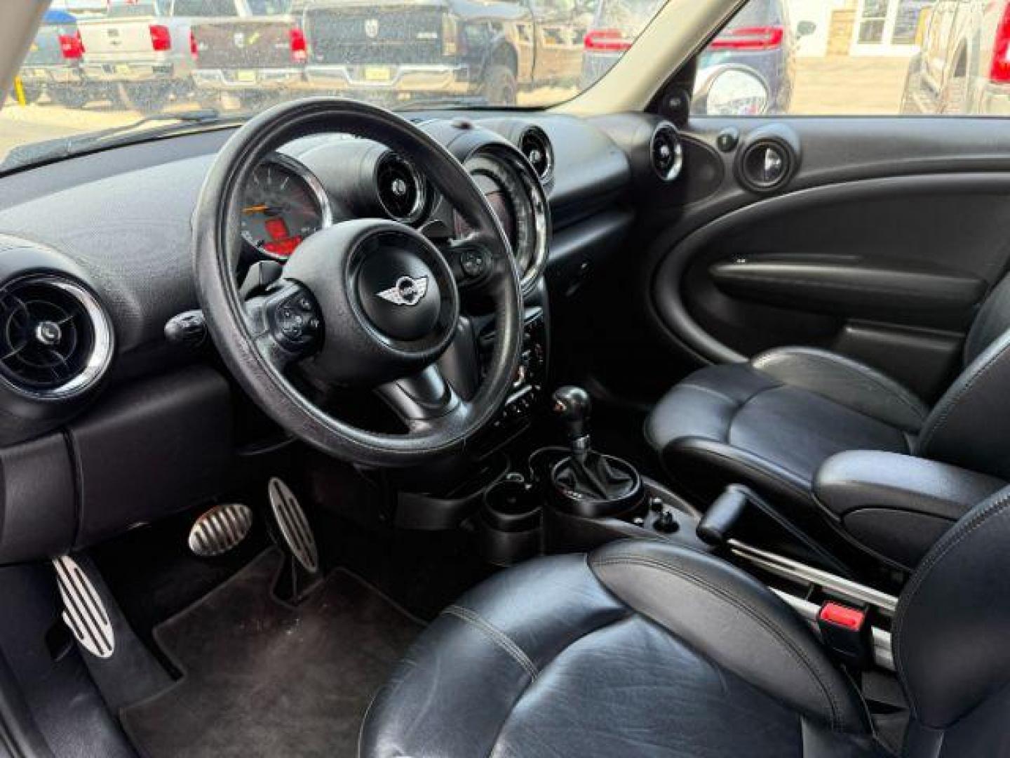 2015 Black Sport Stripes /Carbon Black MINI Countryman Cooper S (WMWZC5C56FW) with an 1.6L I-4 gasoline direct injection engine, AUTOMATIC transmission, located at 1235 N Woodruff Ave., Idaho Falls, 83401, (208) 523-1053, 43.507172, -112.000488 - At Timberline Auto, finding a great deal on your next vehicle is always easy! Our experienced sales staff's goal is to help find you the right vehicle at the right price! Our knowledgeable finance department has options for almost any credit score. We offer extended service contract options to prote - Photo#9