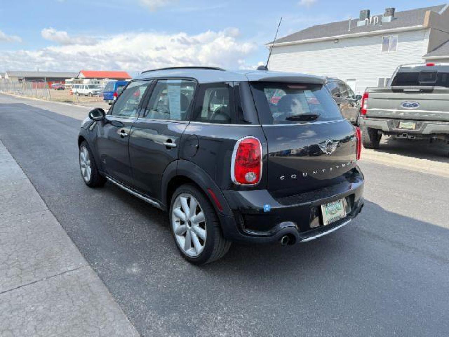 2015 Black Sport Stripes /Carbon Black MINI Countryman Cooper S (WMWZC5C56FW) with an 1.6L I-4 gasoline direct injection engine, AUTOMATIC transmission, located at 1235 N Woodruff Ave., Idaho Falls, 83401, (208) 523-1053, 43.507172, -112.000488 - At Timberline Auto, finding a great deal on your next vehicle is always easy! Our experienced sales staff's goal is to help find you the right vehicle at the right price! Our knowledgeable finance department has options for almost any credit score. We offer extended service contract options to prote - Photo#1
