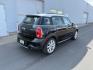 2015 Black Sport Stripes /Carbon Black MINI Countryman Cooper S (WMWZC5C56FW) with an 1.6L I-4 gasoline direct injection engine, AUTOMATIC transmission, located at 1235 N Woodruff Ave., Idaho Falls, 83401, (208) 523-1053, 43.507172, -112.000488 - At Timberline Auto, finding a great deal on your next vehicle is always easy! Our experienced sales staff's goal is to help find you the right vehicle at the right price! Our knowledgeable finance department has options for almost any credit score. We offer extended service contract options to prote - Photo#3