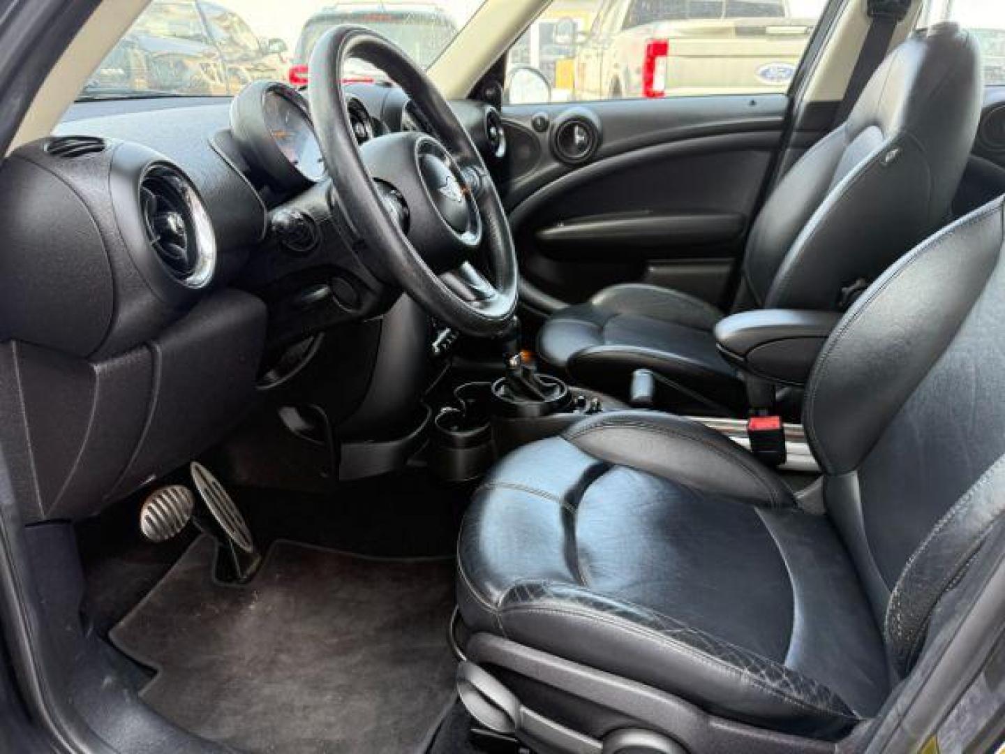 2015 Black Sport Stripes /Carbon Black MINI Countryman Cooper S (WMWZC5C56FW) with an 1.6L I-4 gasoline direct injection engine, AUTOMATIC transmission, located at 1235 N Woodruff Ave., Idaho Falls, 83401, (208) 523-1053, 43.507172, -112.000488 - At Timberline Auto, finding a great deal on your next vehicle is always easy! Our experienced sales staff's goal is to help find you the right vehicle at the right price! Our knowledgeable finance department has options for almost any credit score. We offer extended service contract options to prote - Photo#8