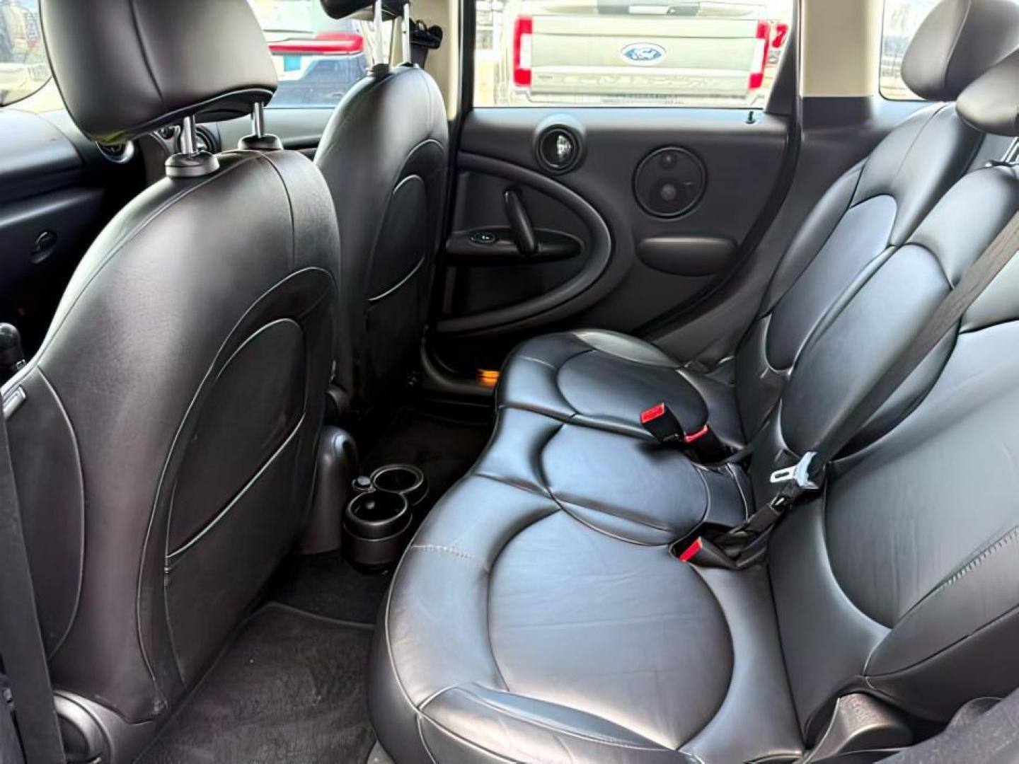 2015 Black Sport Stripes /Carbon Black MINI Countryman Cooper S (WMWZC5C56FW) with an 1.6L I-4 gasoline direct injection engine, AUTOMATIC transmission, located at 1235 N Woodruff Ave., Idaho Falls, 83401, (208) 523-1053, 43.507172, -112.000488 - At Timberline Auto, finding a great deal on your next vehicle is always easy! Our experienced sales staff's goal is to help find you the right vehicle at the right price! Our knowledgeable finance department has options for almost any credit score. We offer extended service contract options to prote - Photo#16