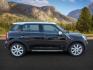2015 Black Sport Stripes /Carbon Black Mini Countryman (WMWZC5C56FW) with an 16L I-4 gasoline direct injection engine, Automatic transmission, located at 1175 N Woodruff Ave, Idaho Falls, ID, 83401, 43.506901, -111.999657 - At Timberline Auto, finding a great deal on your next vehicle is always easy! Our experienced sales staff's goal is to help find you the right vehicle at the right price! Our knowledgeable finance department has options for almost any credit score. We offer extended service contract options to prote - Photo#4