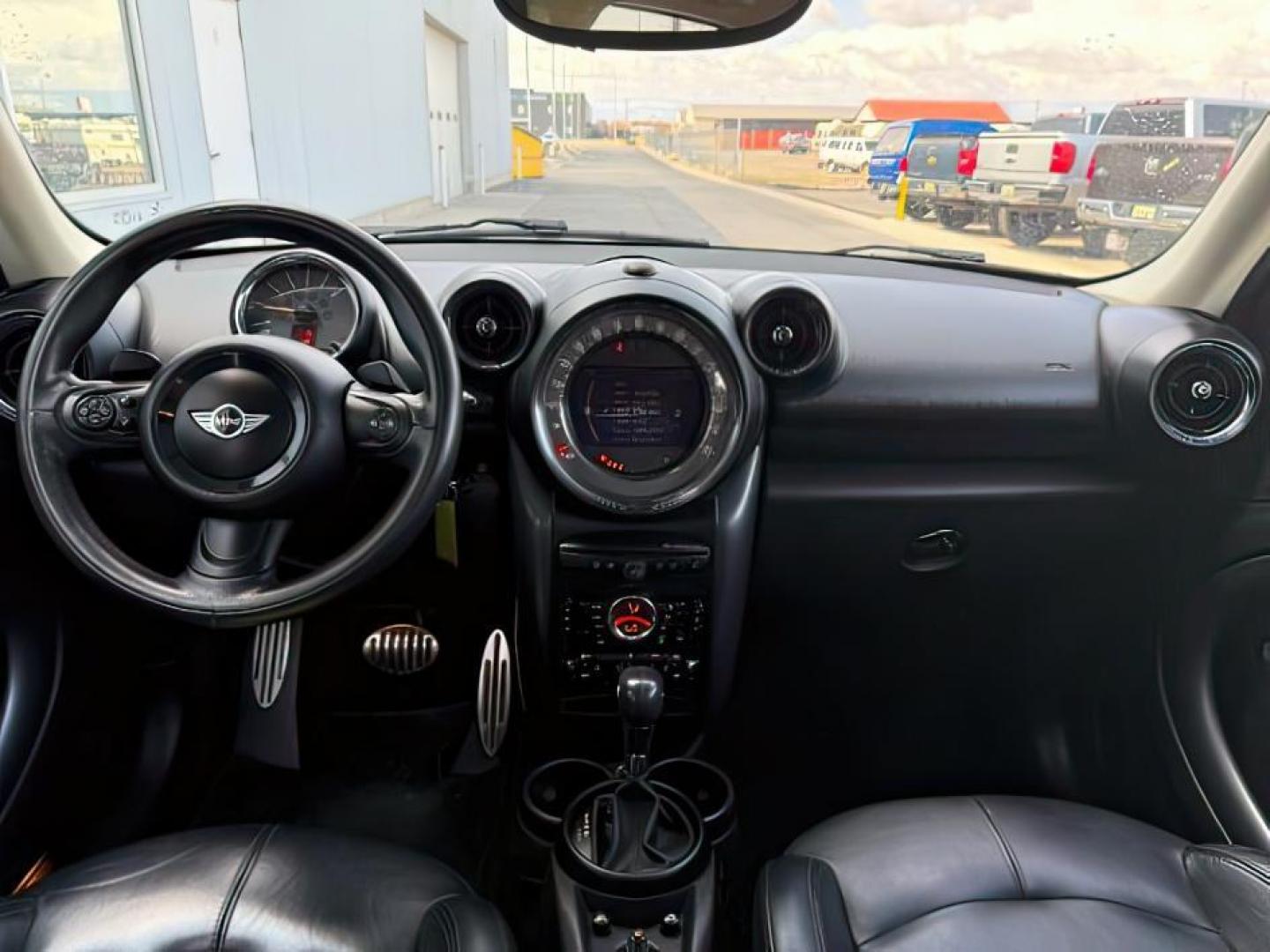 2015 Black Sport Stripes /Carbon Black Mini Countryman (WMWZC5C56FW) with an 16L I-4 gasoline direct injection engine, Automatic transmission, located at 1175 N Woodruff Ave, Idaho Falls, ID, 83401, 43.506901, -111.999657 - At Timberline Auto, finding a great deal on your next vehicle is always easy! Our experienced sales staff's goal is to help find you the right vehicle at the right price! Our knowledgeable finance department has options for almost any credit score. We offer extended service contract options to prote - Photo#13