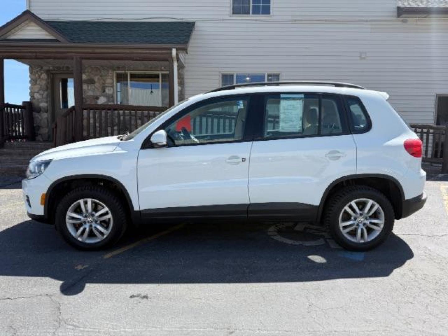 2016 Pure White /Sandstone Beige Volkswagen Tiguan S (WVGAV7AX7GW) with an 2L I-4 gasoline direct injection engine, AUTOMATIC transmission, located at 1235 N Woodruff Ave., Idaho Falls, 83401, (208) 523-1053, 43.507172, -112.000488 - At Timberline Auto, finding a great deal on your next vehicle is always easy! Our experienced sales staff's goal is to help find you the right vehicle at the right price! Our knowledgeable finance department has options for almost any credit score. We offer extended service contract options to prote - Photo#1
