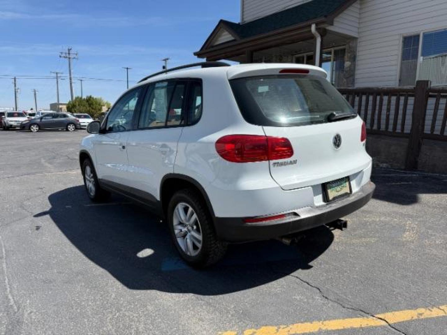 2016 Pure White /Sandstone Beige Volkswagen Tiguan S (WVGAV7AX7GW) with an 2L I-4 gasoline direct injection engine, AUTOMATIC transmission, located at 1235 N Woodruff Ave., Idaho Falls, 83401, (208) 523-1053, 43.507172, -112.000488 - At Timberline Auto, finding a great deal on your next vehicle is always easy! Our experienced sales staff's goal is to help find you the right vehicle at the right price! Our knowledgeable finance department has options for almost any credit score. We offer extended service contract options to prote - Photo#2