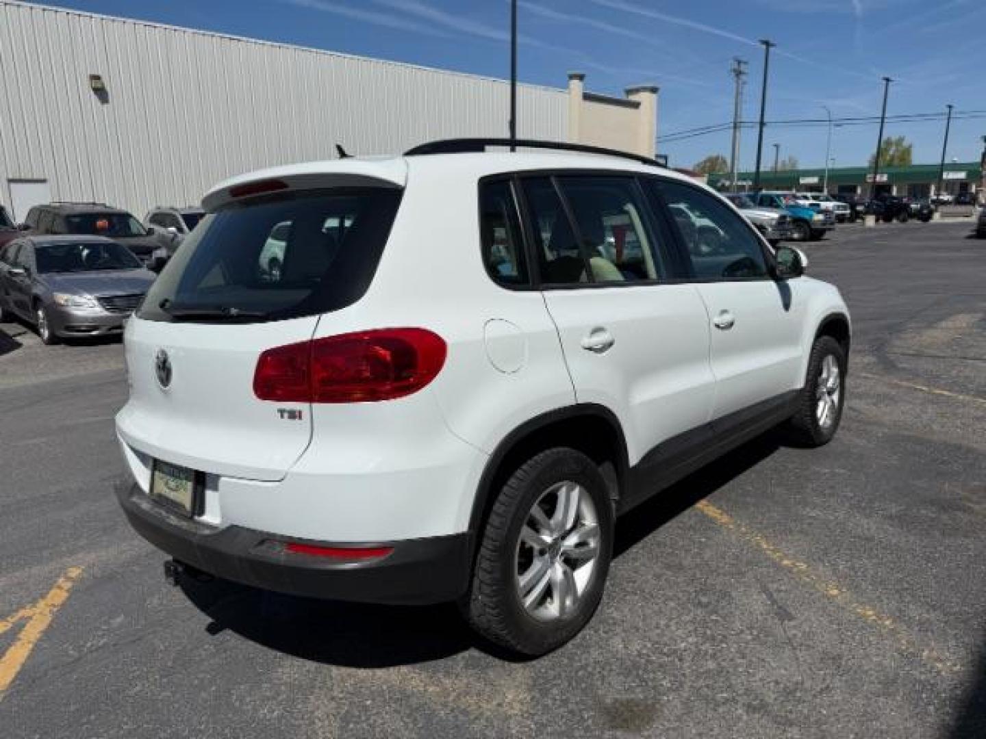 2016 Pure White /Sandstone Beige Volkswagen Tiguan S (WVGAV7AX7GW) with an 2L I-4 gasoline direct injection engine, AUTOMATIC transmission, located at 1235 N Woodruff Ave., Idaho Falls, 83401, (208) 523-1053, 43.507172, -112.000488 - At Timberline Auto, finding a great deal on your next vehicle is always easy! Our experienced sales staff's goal is to help find you the right vehicle at the right price! Our knowledgeable finance department has options for almost any credit score. We offer extended service contract options to prote - Photo#4