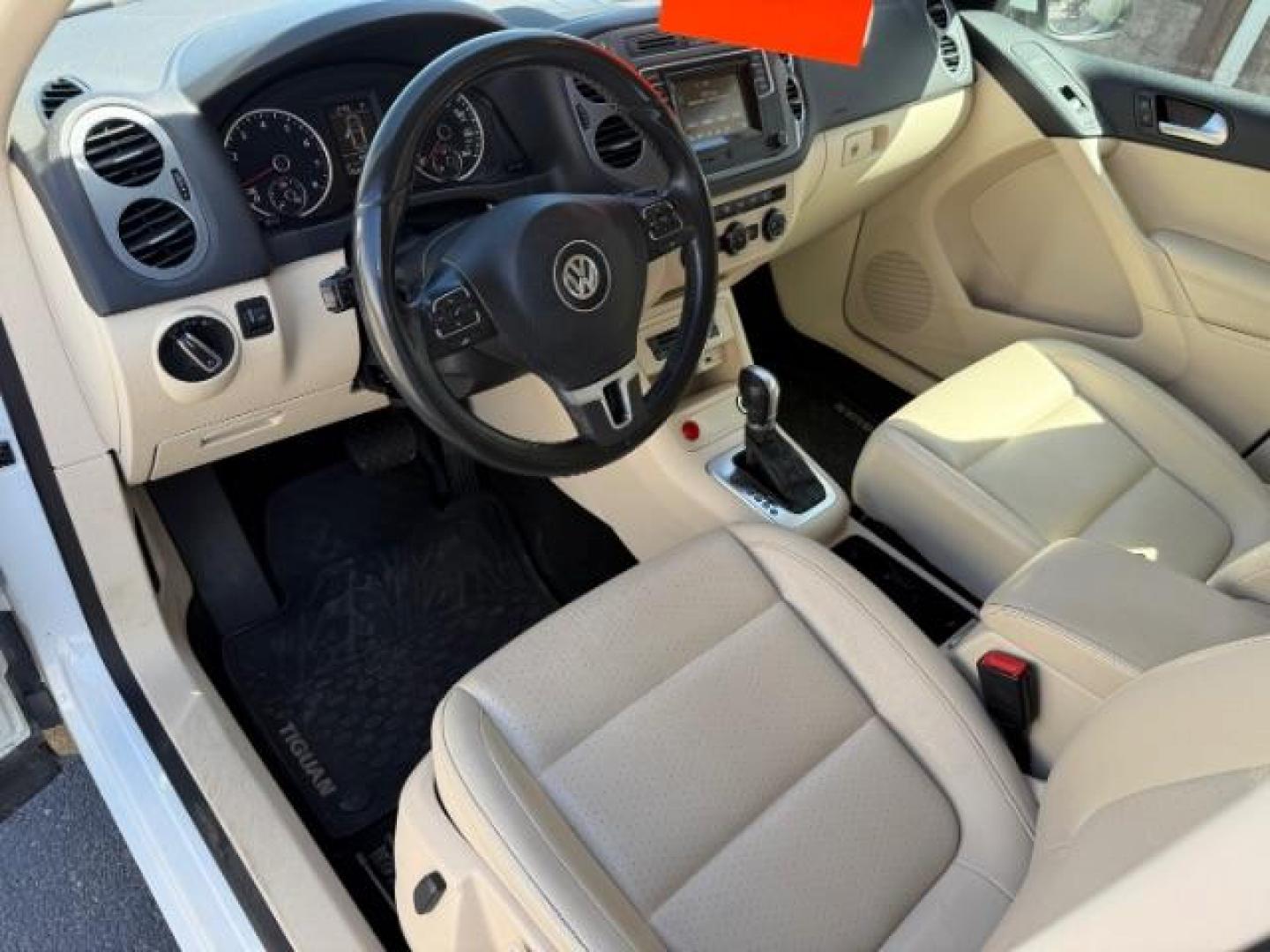 2016 Pure White /Sandstone Beige Volkswagen Tiguan S (WVGAV7AX7GW) with an 2L I-4 gasoline direct injection engine, AUTOMATIC transmission, located at 1235 N Woodruff Ave., Idaho Falls, 83401, (208) 523-1053, 43.507172, -112.000488 - At Timberline Auto, finding a great deal on your next vehicle is always easy! Our experienced sales staff's goal is to help find you the right vehicle at the right price! Our knowledgeable finance department has options for almost any credit score. We offer extended service contract options to prote - Photo#11