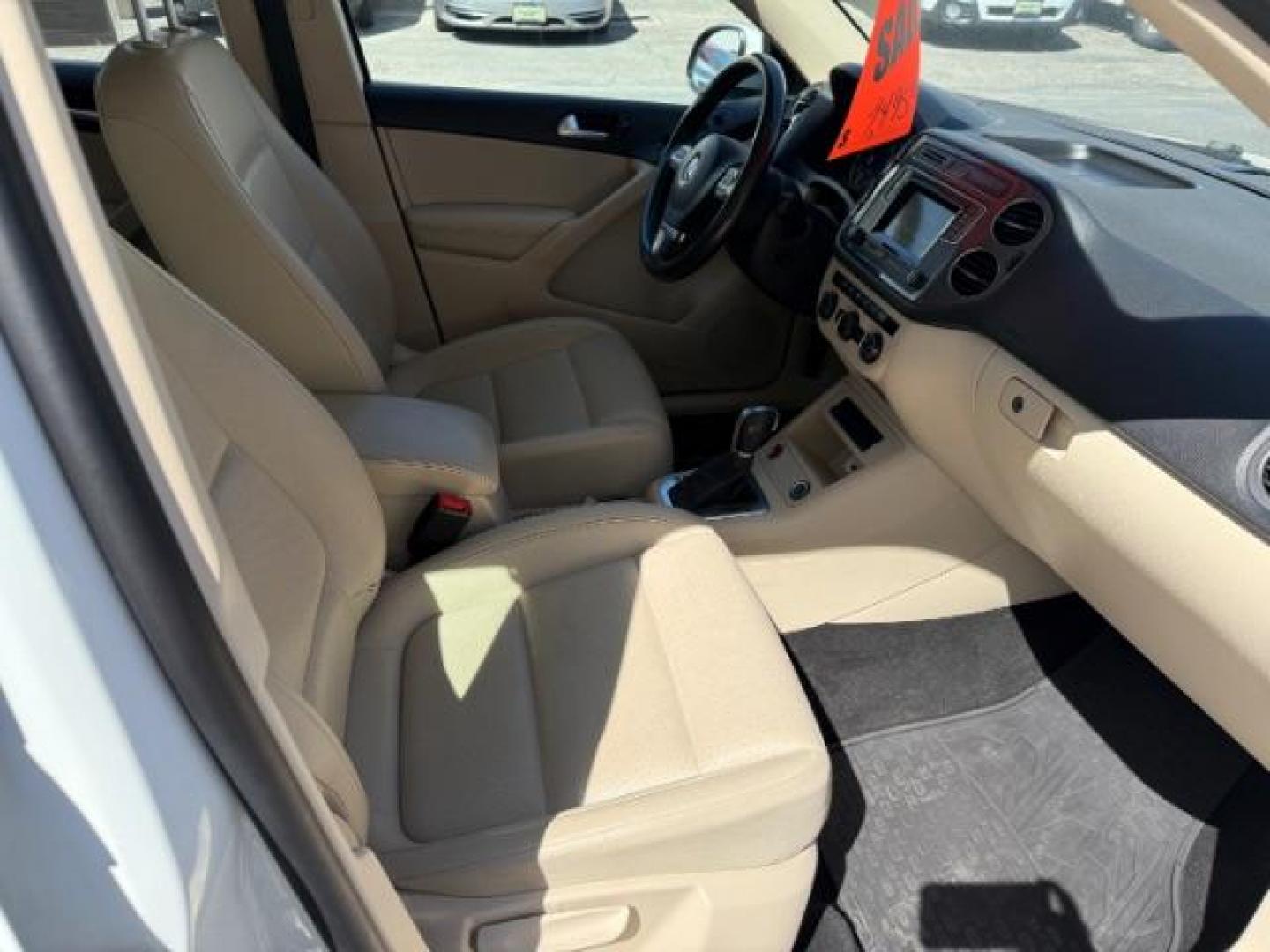 2016 Pure White /Sandstone Beige Volkswagen Tiguan S (WVGAV7AX7GW) with an 2L I-4 gasoline direct injection engine, AUTOMATIC transmission, located at 1235 N Woodruff Ave., Idaho Falls, 83401, (208) 523-1053, 43.507172, -112.000488 - At Timberline Auto, finding a great deal on your next vehicle is always easy! Our experienced sales staff's goal is to help find you the right vehicle at the right price! Our knowledgeable finance department has options for almost any credit score. We offer extended service contract options to prote - Photo#13