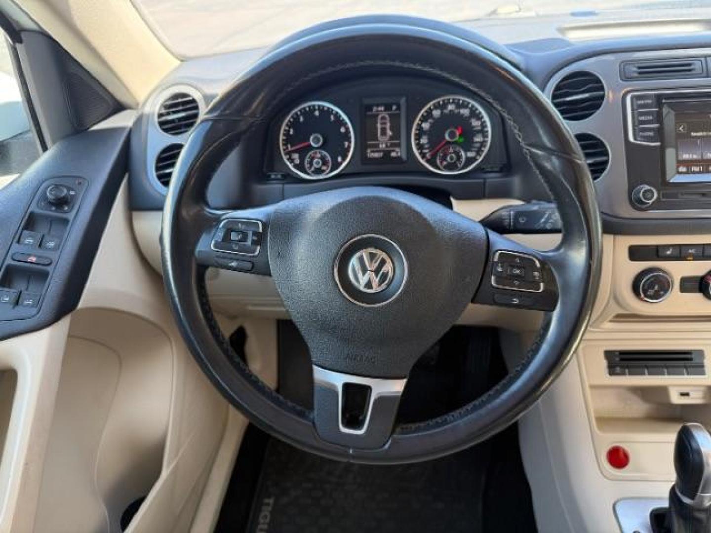 2016 Pure White /Sandstone Beige Volkswagen Tiguan S (WVGAV7AX7GW) with an 2L I-4 gasoline direct injection engine, AUTOMATIC transmission, located at 1235 N Woodruff Ave., Idaho Falls, 83401, (208) 523-1053, 43.507172, -112.000488 - At Timberline Auto, finding a great deal on your next vehicle is always easy! Our experienced sales staff's goal is to help find you the right vehicle at the right price! Our knowledgeable finance department has options for almost any credit score. We offer extended service contract options to prote - Photo#18
