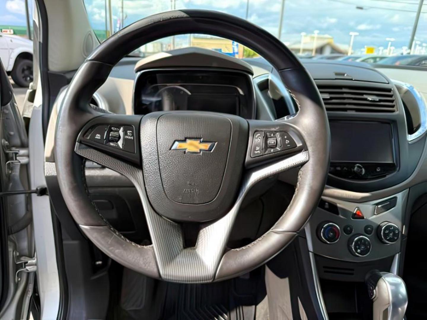 2016 Champagne Silver Metallic /Jet Black/Light Titanium Chevrolet Trax LTZ (3GNCJRSB1GL) with an Ecotec 1.4L I-4 DOHC engine, AUTOMATIC transmission, located at 1235 N Woodruff Ave., Idaho Falls, 83401, (208) 523-1053, 43.507172, -112.000488 - At Timberline Auto, finding a great deal on your next vehicle is always easy! Our experienced sales staff's goal is to help find you the right vehicle at the right price! Our knowledgeable finance department has options for almost any credit score. We offer extended service contract options to prote - Photo#13