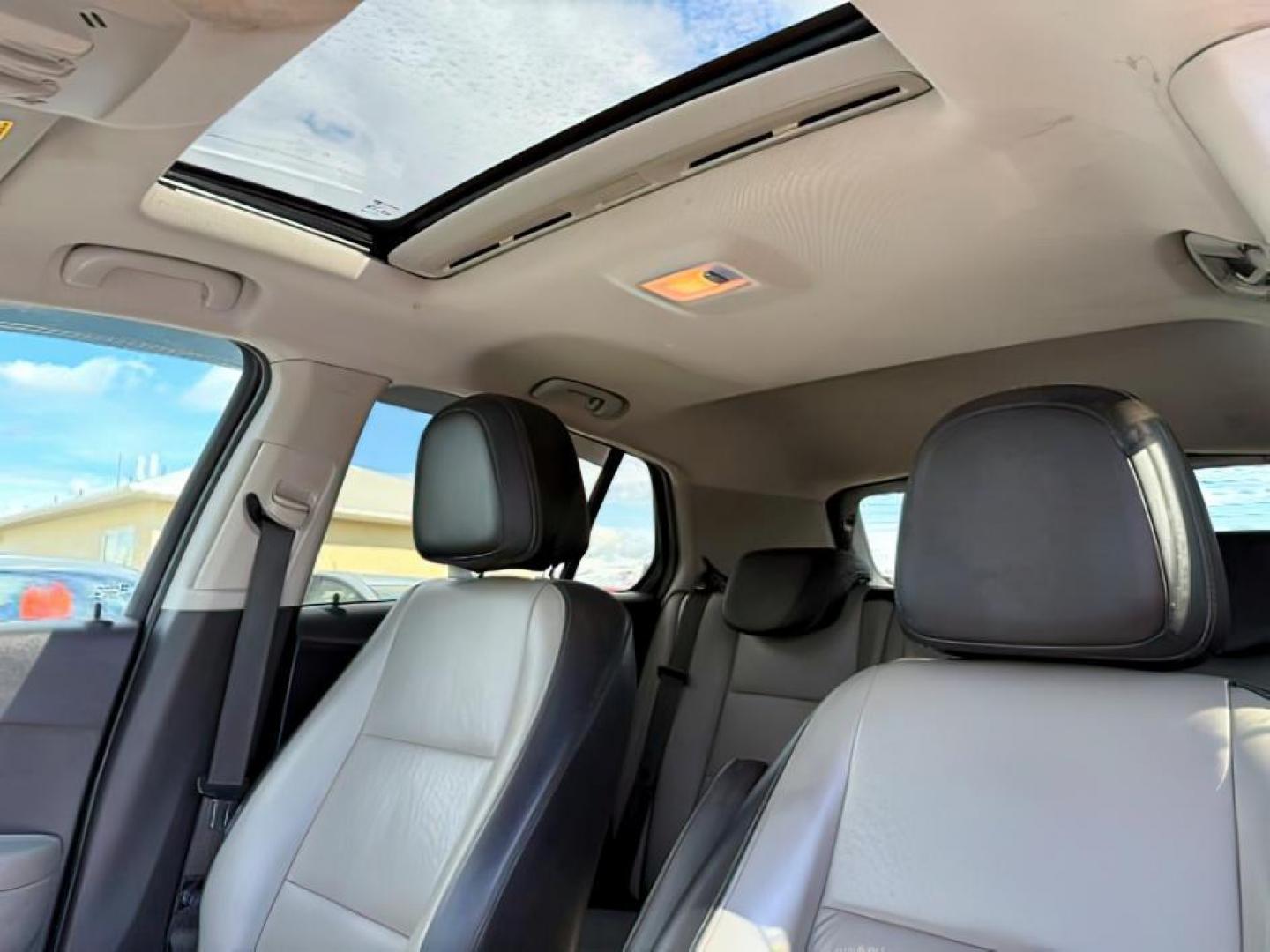 2016 Champagne Silver Metallic /Jet Black/Light Titanium Chevrolet Trax LTZ (3GNCJRSB1GL) with an Ecotec 1.4L I-4 DOHC engine, AUTOMATIC transmission, located at 1235 N Woodruff Ave., Idaho Falls, 83401, (208) 523-1053, 43.507172, -112.000488 - At Timberline Auto, finding a great deal on your next vehicle is always easy! Our experienced sales staff's goal is to help find you the right vehicle at the right price! Our knowledgeable finance department has options for almost any credit score. We offer extended service contract options to prote - Photo#17