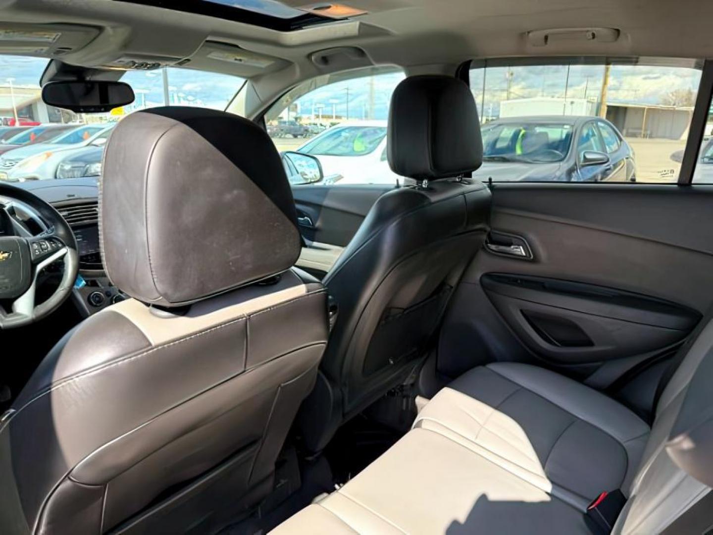 2016 Champagne Silver Metallic /Jet Black/Light Titanium Chevrolet Trax LTZ (3GNCJRSB1GL) with an Ecotec 1.4L I-4 DOHC engine, AUTOMATIC transmission, located at 1235 N Woodruff Ave., Idaho Falls, 83401, (208) 523-1053, 43.507172, -112.000488 - At Timberline Auto, finding a great deal on your next vehicle is always easy! Our experienced sales staff's goal is to help find you the right vehicle at the right price! Our knowledgeable finance department has options for almost any credit score. We offer extended service contract options to prote - Photo#20