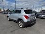 2016 Champagne Silver Metallic /Jet Black/Light Titanium Chevrolet Trax LTZ (3GNCJRSB1GL) with an Ecotec 1.4L I-4 DOHC engine, AUTOMATIC transmission, located at 1235 N Woodruff Ave., Idaho Falls, 83401, (208) 523-1053, 43.507172, -112.000488 - At Timberline Auto, finding a great deal on your next vehicle is always easy! Our experienced sales staff's goal is to help find you the right vehicle at the right price! Our knowledgeable finance department has options for almost any credit score. We offer extended service contract options to prote - Photo#2