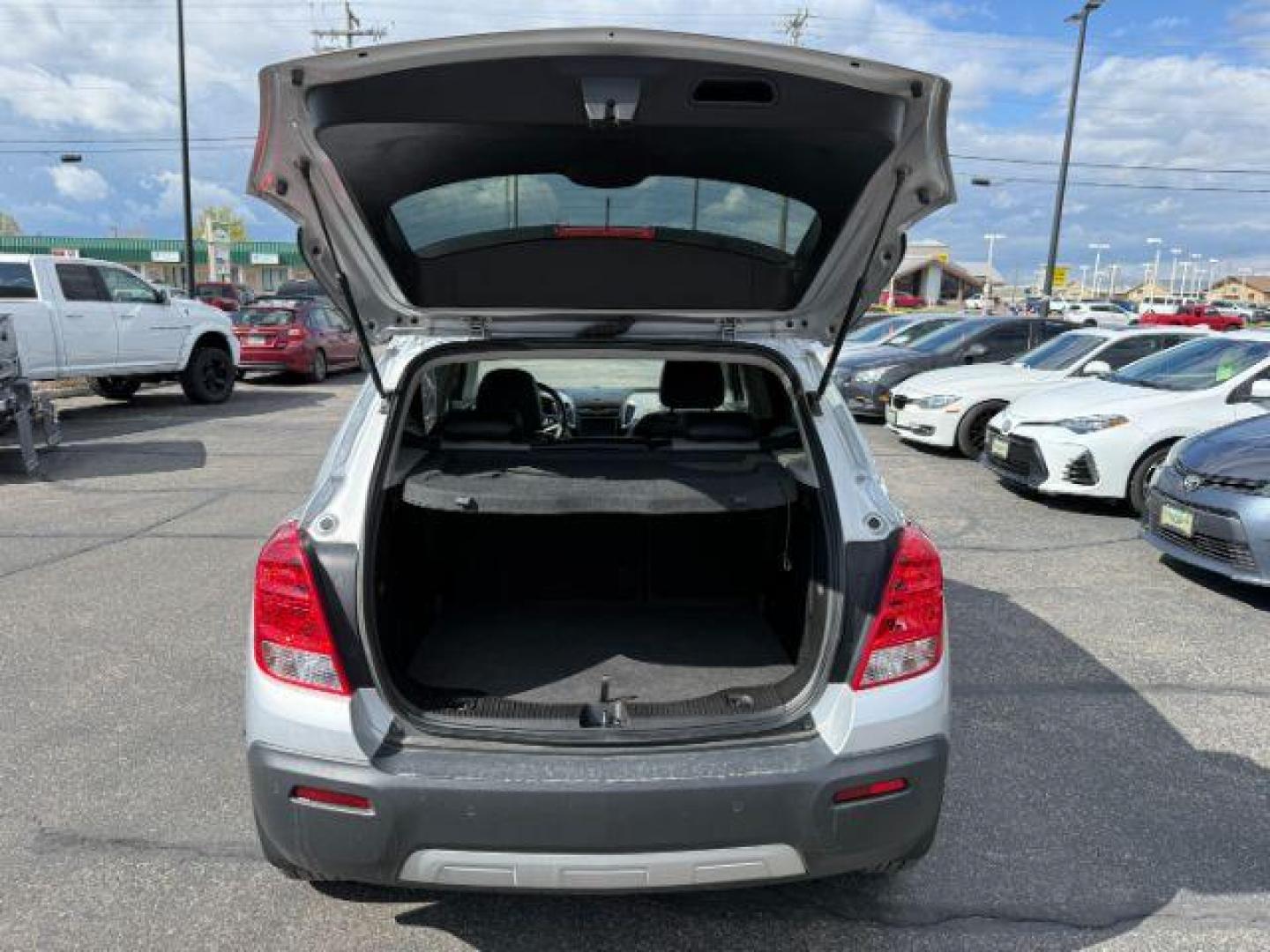 2016 Champagne Silver Metallic /Jet Black/Light Titanium Chevrolet Trax LTZ (3GNCJRSB1GL) with an Ecotec 1.4L I-4 DOHC engine, AUTOMATIC transmission, located at 1235 N Woodruff Ave., Idaho Falls, 83401, (208) 523-1053, 43.507172, -112.000488 - At Timberline Auto, finding a great deal on your next vehicle is always easy! Our experienced sales staff's goal is to help find you the right vehicle at the right price! Our knowledgeable finance department has options for almost any credit score. We offer extended service contract options to prote - Photo#5