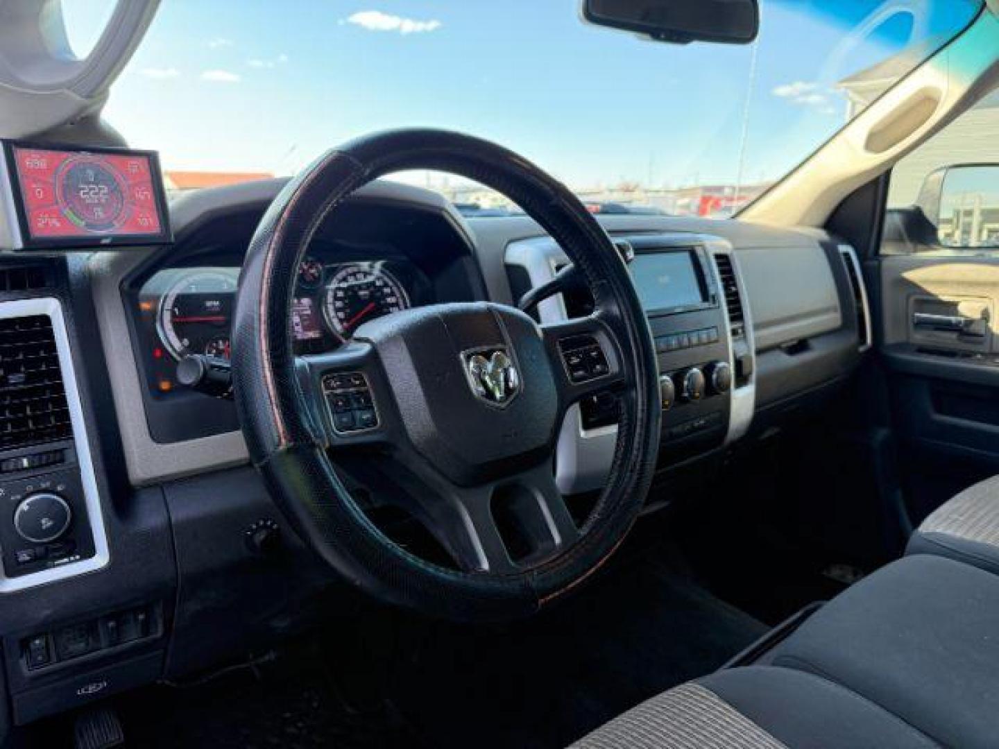 2012 Bright White Clearcoat /Medium Greystone/Dark Slate Ram 2500 SLT (3C6UD5DL6CG) with an Cummins 6.7L I-6 diesel direct injection engine, AUTOMATIC transmission, located at 1235 N Woodruff Ave., Idaho Falls, 83401, (208) 523-1053, 43.507172, -112.000488 - Photo#9