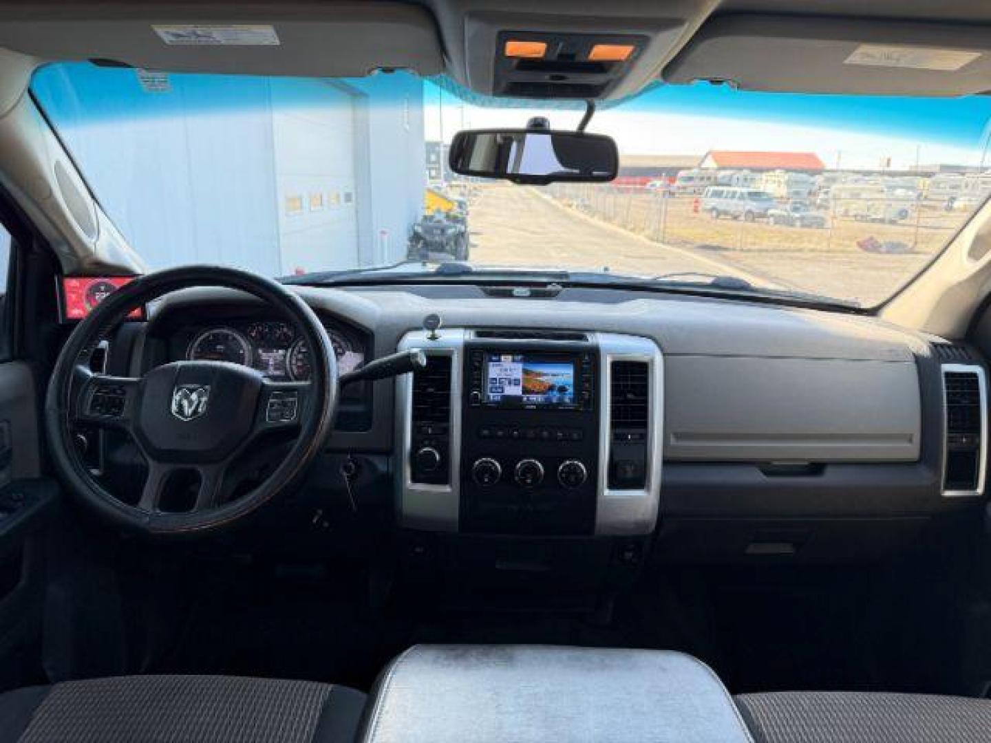 2012 Bright White Clearcoat /Medium Greystone/Dark Slate Ram 2500 SLT (3C6UD5DL6CG) with an Cummins 6.7L I-6 diesel direct injection engine, AUTOMATIC transmission, located at 1235 N Woodruff Ave., Idaho Falls, 83401, (208) 523-1053, 43.507172, -112.000488 - Photo#14