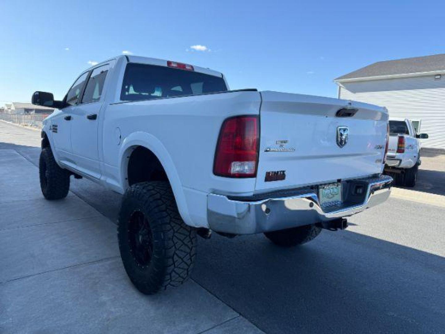 2012 Bright White Clearcoat /Medium Greystone/Dark Slate Ram 2500 SLT (3C6UD5DL6CG) with an Cummins 6.7L I-6 diesel direct injection engine, AUTOMATIC transmission, located at 1235 N Woodruff Ave., Idaho Falls, 83401, (208) 523-1053, 43.507172, -112.000488 - Photo#1