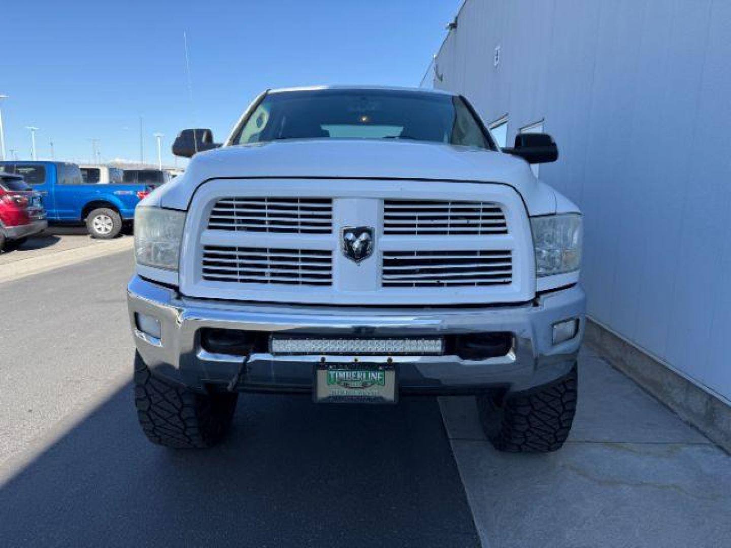 2012 Bright White Clearcoat /Medium Greystone/Dark Slate Ram 2500 SLT (3C6UD5DL6CG) with an Cummins 6.7L I-6 diesel direct injection engine, AUTOMATIC transmission, located at 1235 N Woodruff Ave., Idaho Falls, 83401, (208) 523-1053, 43.507172, -112.000488 - Photo#6