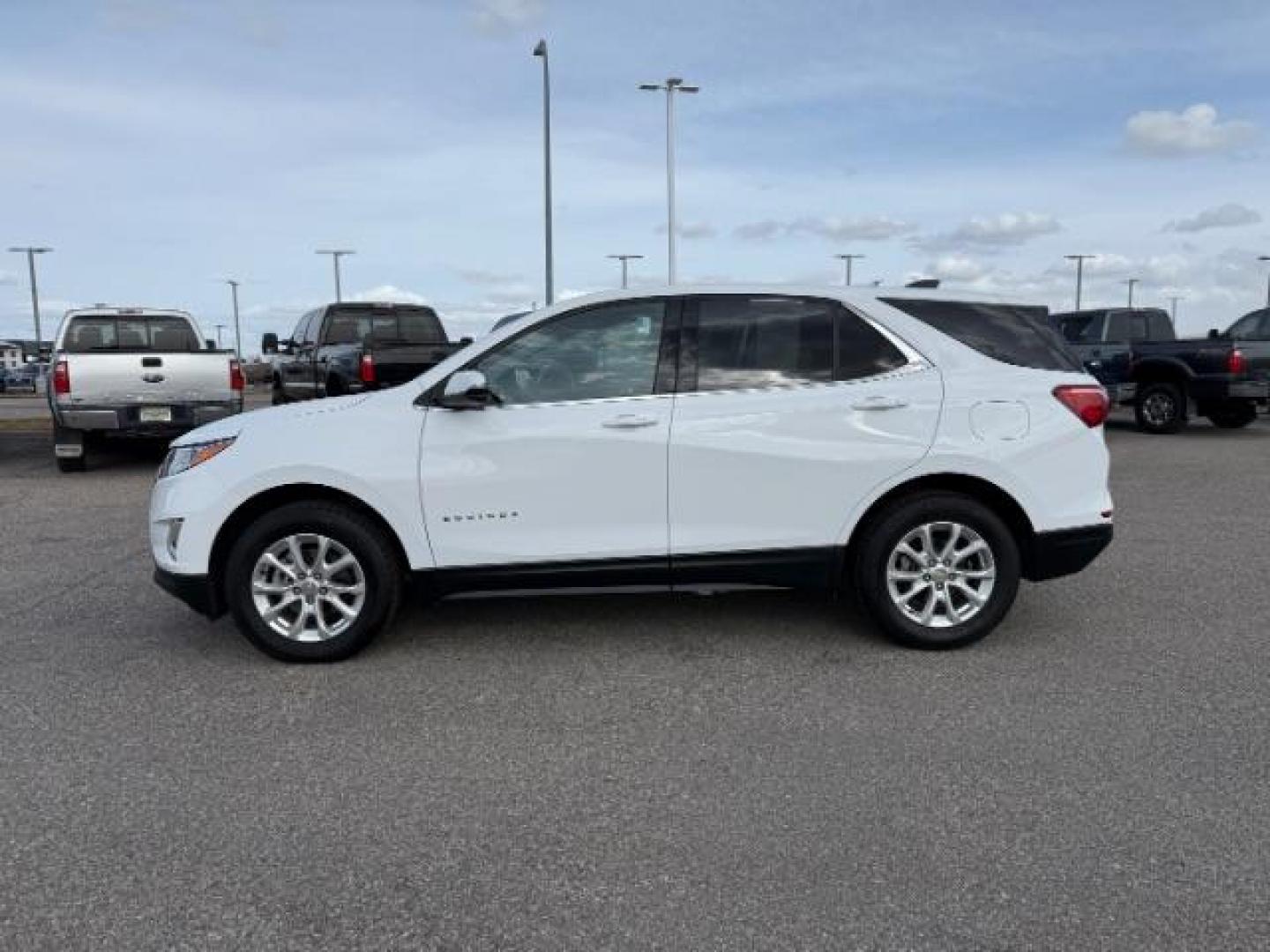 2019 Summit White /Medium Ash Gray Chevrolet Equinox LT (2GNAXUEVXK6) with an 1.5L I-4 gasoline direct injection engine, AUTOMATIC transmission, located at 1235 N Woodruff Ave., Idaho Falls, 83401, (208) 523-1053, 43.507172, -112.000488 - At Timberline Auto, finding a great deal on your next vehicle is always easy! Our experienced sales staff's goal is to help find you the right vehicle at the right price! Our knowledgeable finance department has options for almost any credit score. We offer extended service contract options to prote - Photo#1