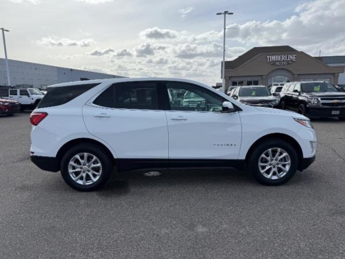 2019 Summit White /Medium Ash Gray Chevrolet Equinox LT (2GNAXUEVXK6) with an 1.5L I-4 gasoline direct injection engine, AUTOMATIC transmission, located at 1235 N Woodruff Ave., Idaho Falls, 83401, (208) 523-1053, 43.507172, -112.000488 - At Timberline Auto, finding a great deal on your next vehicle is always easy! Our experienced sales staff's goal is to help find you the right vehicle at the right price! Our knowledgeable finance department has options for almost any credit score. We offer extended service contract options to prote - Photo#5