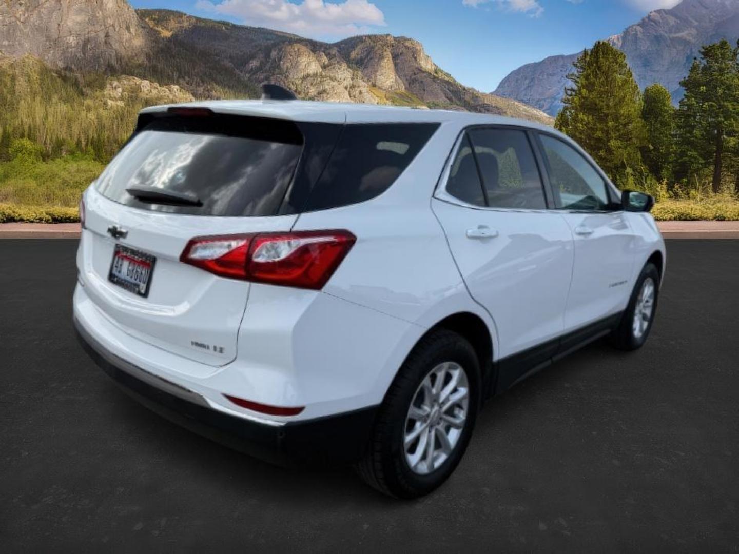 2019 Summit White /Medium Ash Gray Chevrolet Equinox LT (2GNAXUEVXK6) with an 1.5L I-4 gasoline direct injection engine, AUTOMATIC transmission, located at 1235 N Woodruff Ave., Idaho Falls, 83401, (208) 523-1053, 43.507172, -112.000488 - At Timberline Auto, finding a great deal on your next vehicle is always easy! Our experienced sales staff's goal is to help find you the right vehicle at the right price! Our knowledgeable finance department has options for almost any credit score. We offer extended service contract options to prote - Photo#4