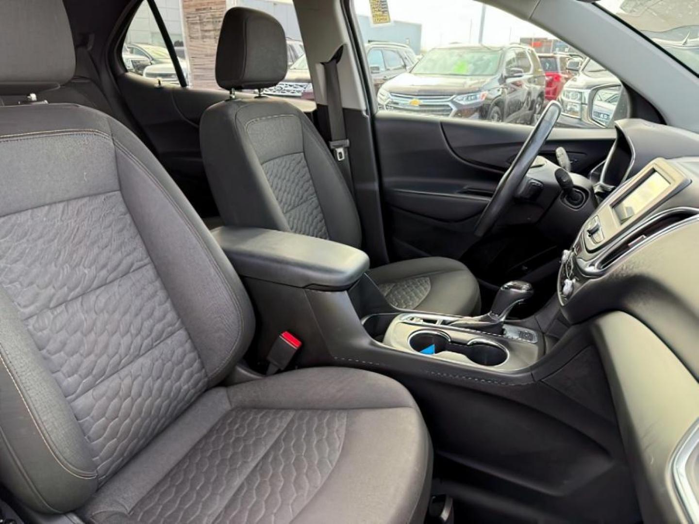 2019 Summit White /Medium Ash Gray Chevrolet Equinox LT (2GNAXUEVXK6) with an 1.5L I-4 gasoline direct injection engine, AUTOMATIC transmission, located at 1235 N Woodruff Ave., Idaho Falls, 83401, (208) 523-1053, 43.507172, -112.000488 - At Timberline Auto, finding a great deal on your next vehicle is always easy! Our experienced sales staff's goal is to help find you the right vehicle at the right price! Our knowledgeable finance department has options for almost any credit score. We offer extended service contract options to prote - Photo#16