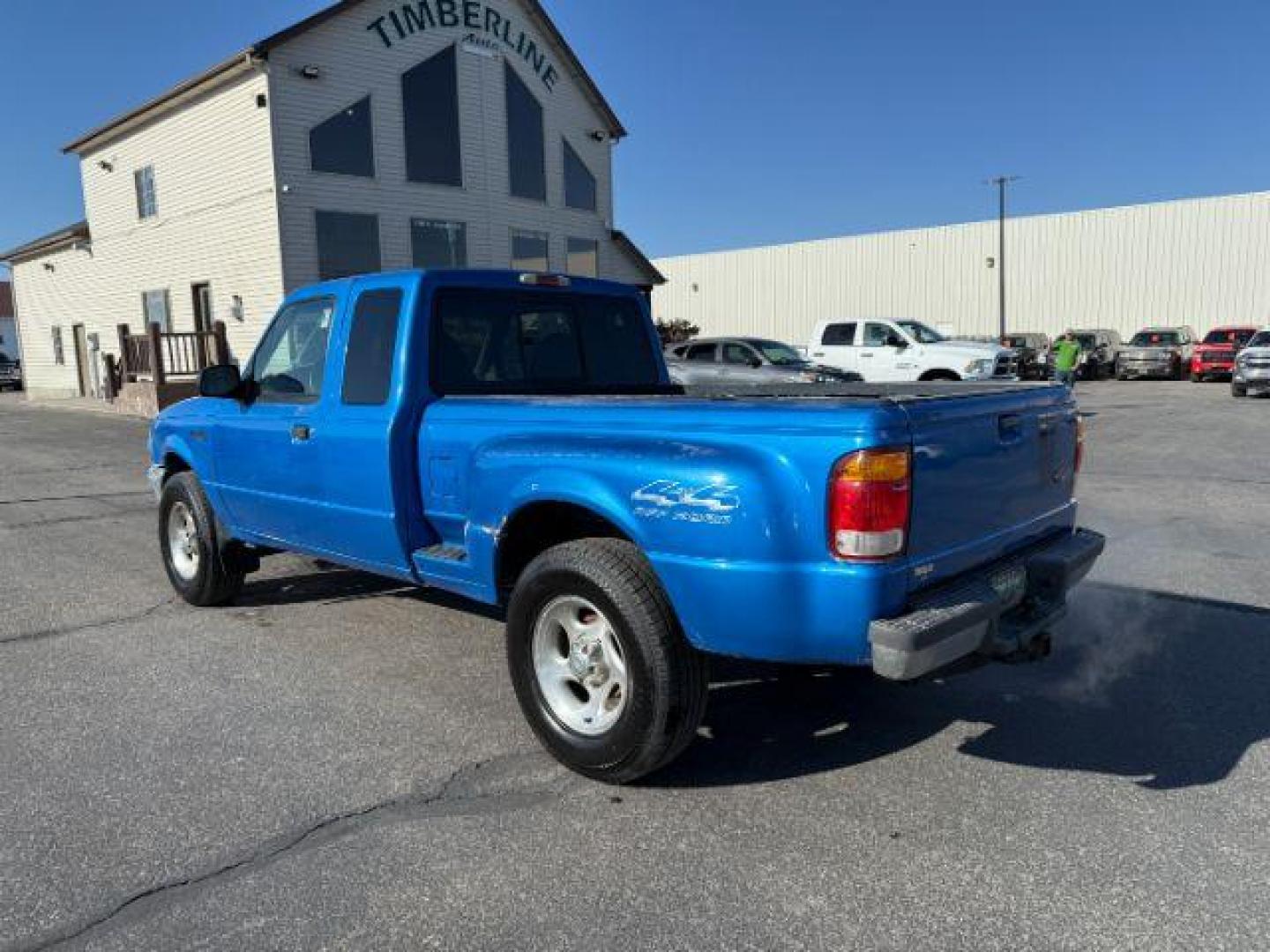 1999 BLUE /Medium Graphite Ford Ranger XL | XLT (1FTZR15V2XP) with an 4L V-6 regular unleaded engine, AUTOMATIC transmission, located at 1235 N Woodruff Ave., Idaho Falls, 83401, (208) 523-1053, 43.507172, -112.000488 - At Timberline Auto, finding a great deal on your next vehicle is always easy! Our experienced sales staff's goal is to help find you the right vehicle at the right price! Our knowledgeable finance department has options for almost any credit score. We offer extended service contract options to prote - Photo#2