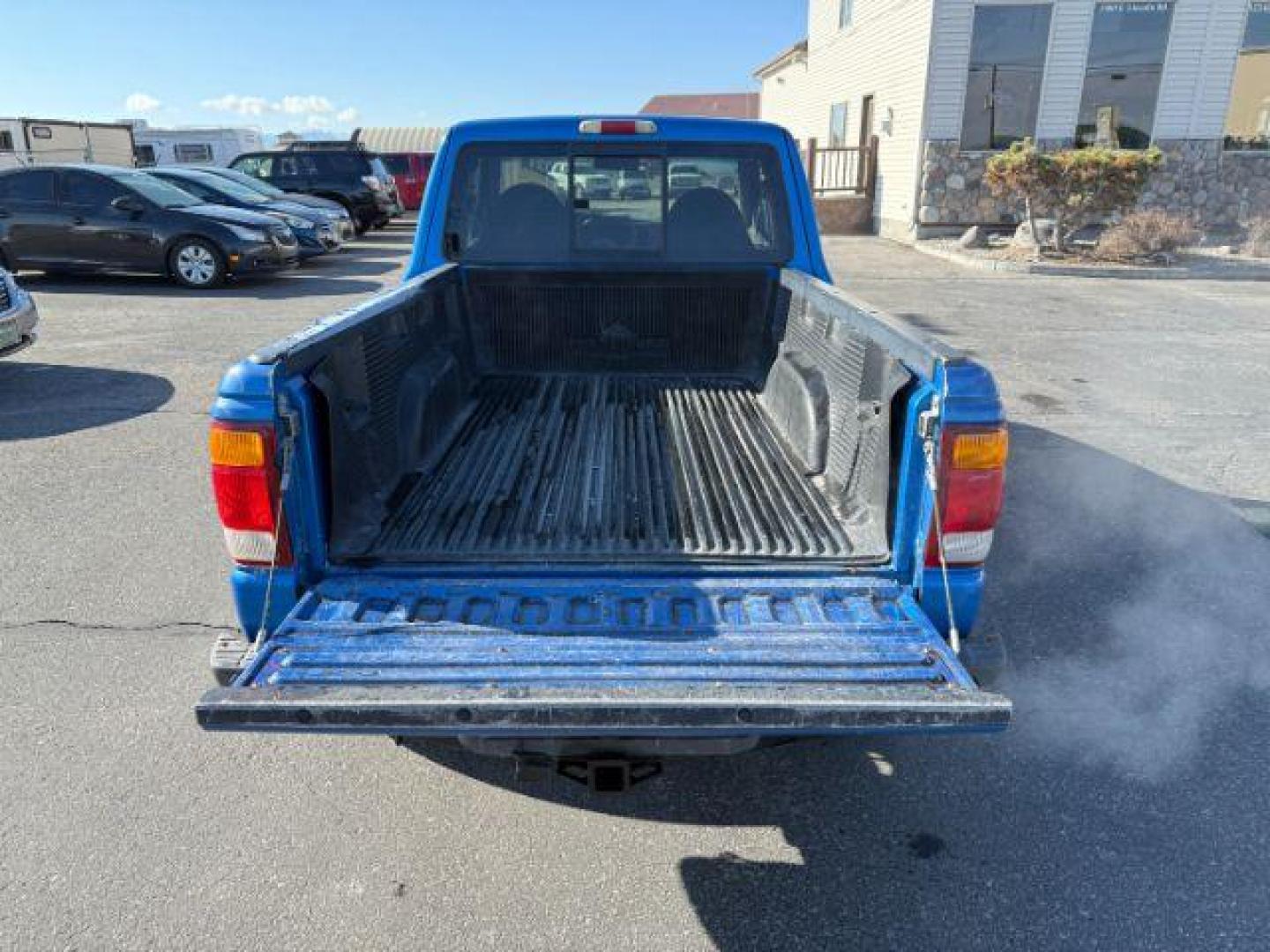 1999 BLUE /Medium Graphite Ford Ranger XL | XLT (1FTZR15V2XP) with an 4L V-6 regular unleaded engine, AUTOMATIC transmission, located at 1235 N Woodruff Ave., Idaho Falls, 83401, (208) 523-1053, 43.507172, -112.000488 - At Timberline Auto, finding a great deal on your next vehicle is always easy! Our experienced sales staff's goal is to help find you the right vehicle at the right price! Our knowledgeable finance department has options for almost any credit score. We offer extended service contract options to prote - Photo#4