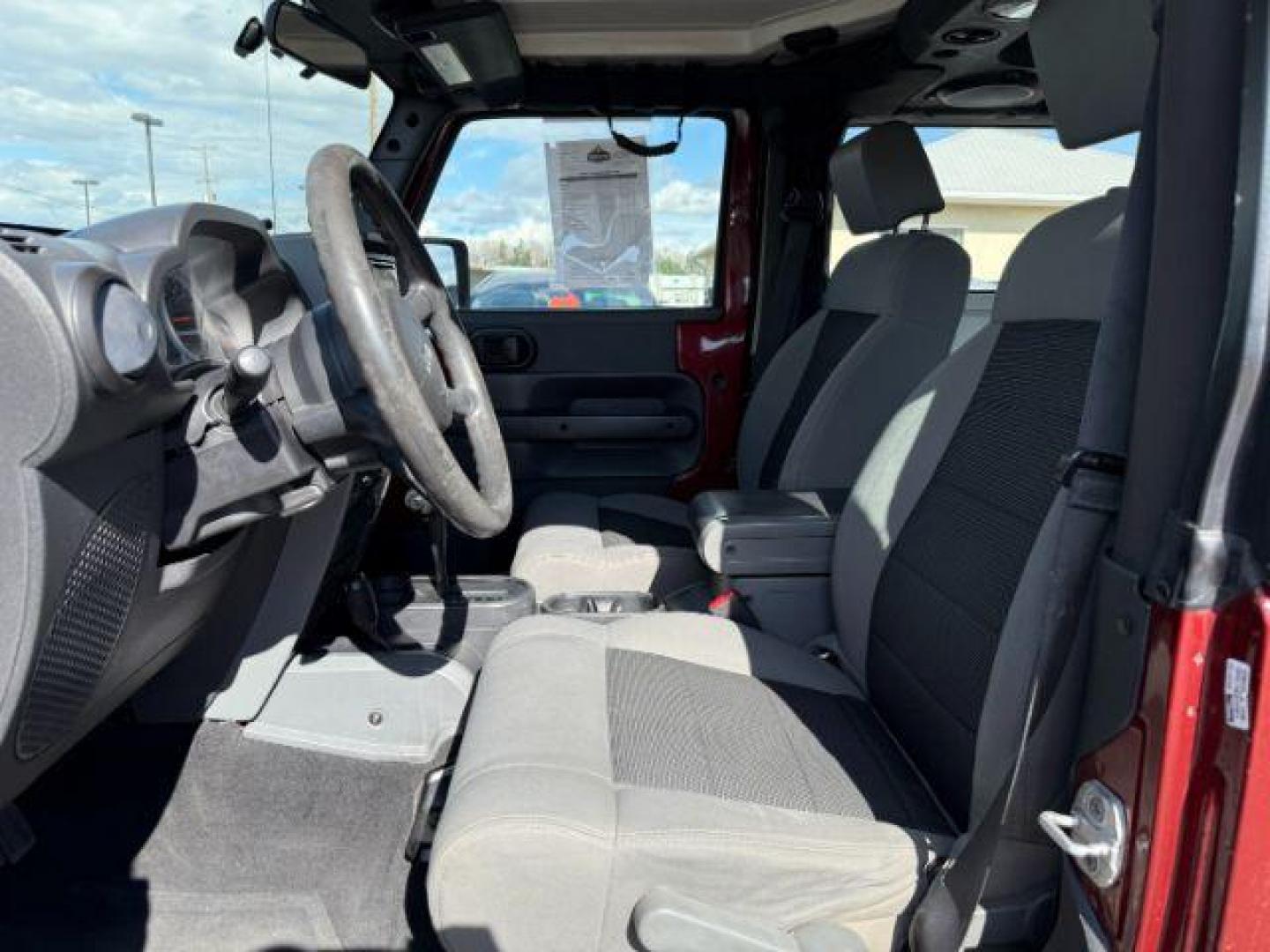 2010 MAROON /Dark Slate Gray/Med Slate Gray Jeep Wrangler Sport (1J4AA2D12AL) with an 3.8L V-6 regular unleaded engine, AUTOMATIC transmission, located at 1235 N Woodruff Ave., Idaho Falls, 83401, (208) 523-1053, 43.507172, -112.000488 - At Timberline Auto, finding a great deal on your next vehicle is always easy! Our experienced sales staff's goal is to help find you the right vehicle at the right price! Our knowledgeable finance department has options for almost any credit score. We offer extended service contract options to prote - Photo#9