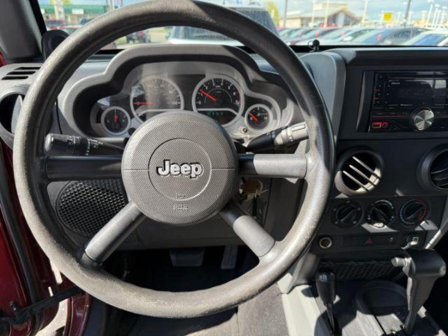 2010 MAROON /Dark Slate Gray/Med Slate Gray Jeep Wrangler Sport (1J4AA2D12AL) with an 3.8L V-6 regular unleaded engine, AUTOMATIC transmission, located at 1235 N Woodruff Ave., Idaho Falls, 83401, (208) 523-1053, 43.507172, -112.000488 - At Timberline Auto, finding a great deal on your next vehicle is always easy! Our experienced sales staff's goal is to help find you the right vehicle at the right price! Our knowledgeable finance department has options for almost any credit score. We offer extended service contract options to prote - Photo#11