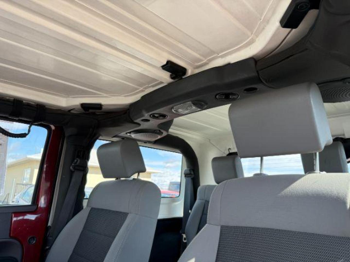 2010 MAROON /Dark Slate Gray/Med Slate Gray Jeep Wrangler Sport (1J4AA2D12AL) with an 3.8L V-6 regular unleaded engine, AUTOMATIC transmission, located at 1235 N Woodruff Ave., Idaho Falls, 83401, (208) 523-1053, 43.507172, -112.000488 - At Timberline Auto, finding a great deal on your next vehicle is always easy! Our experienced sales staff's goal is to help find you the right vehicle at the right price! Our knowledgeable finance department has options for almost any credit score. We offer extended service contract options to prote - Photo#14